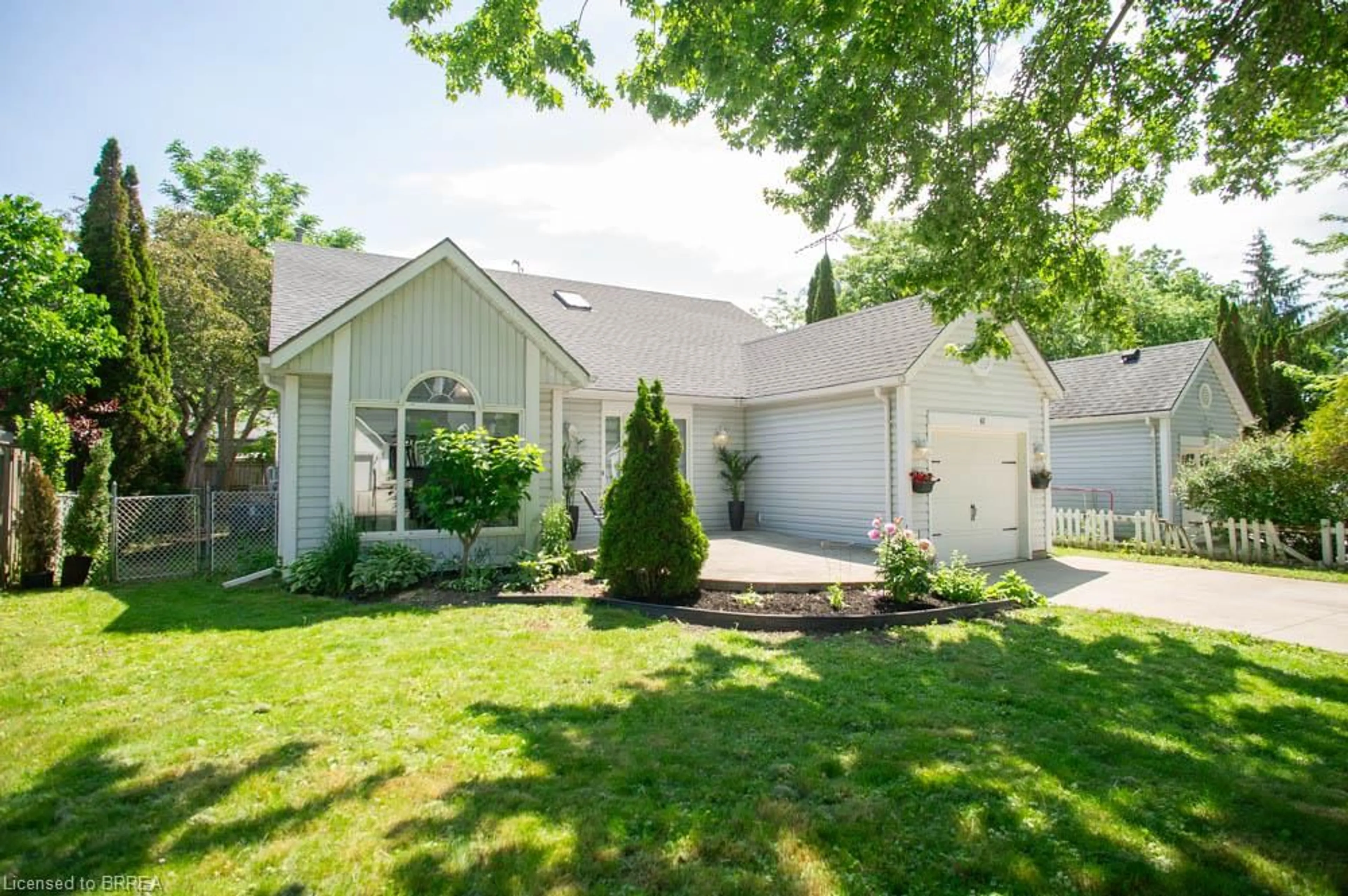 Home with vinyl exterior material, street for 61 Leslie Ave, Port Dover Ontario N0A 1N4