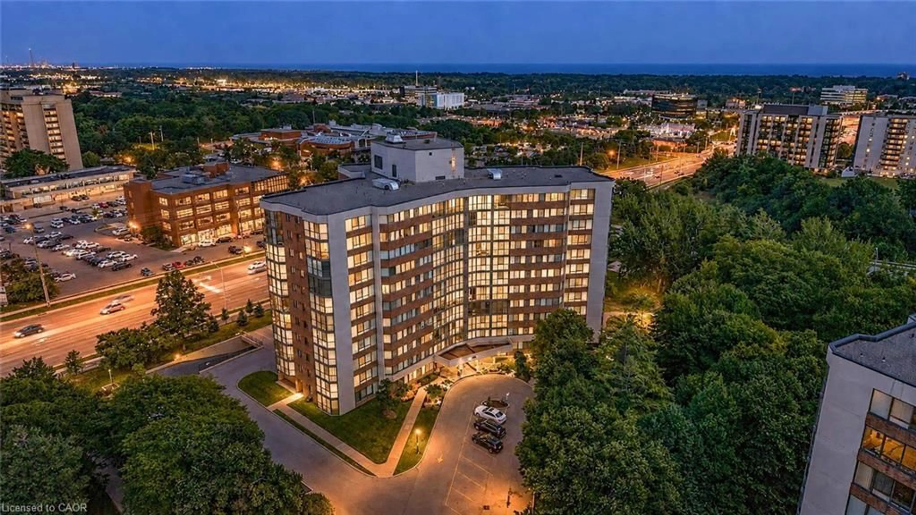 A pic from outside/outdoor area/front of a property/back of a property/a pic from drone, city buildings view from balcony for 1230 Marlborough Crt #202, Oakville Ontario L6H 3K6