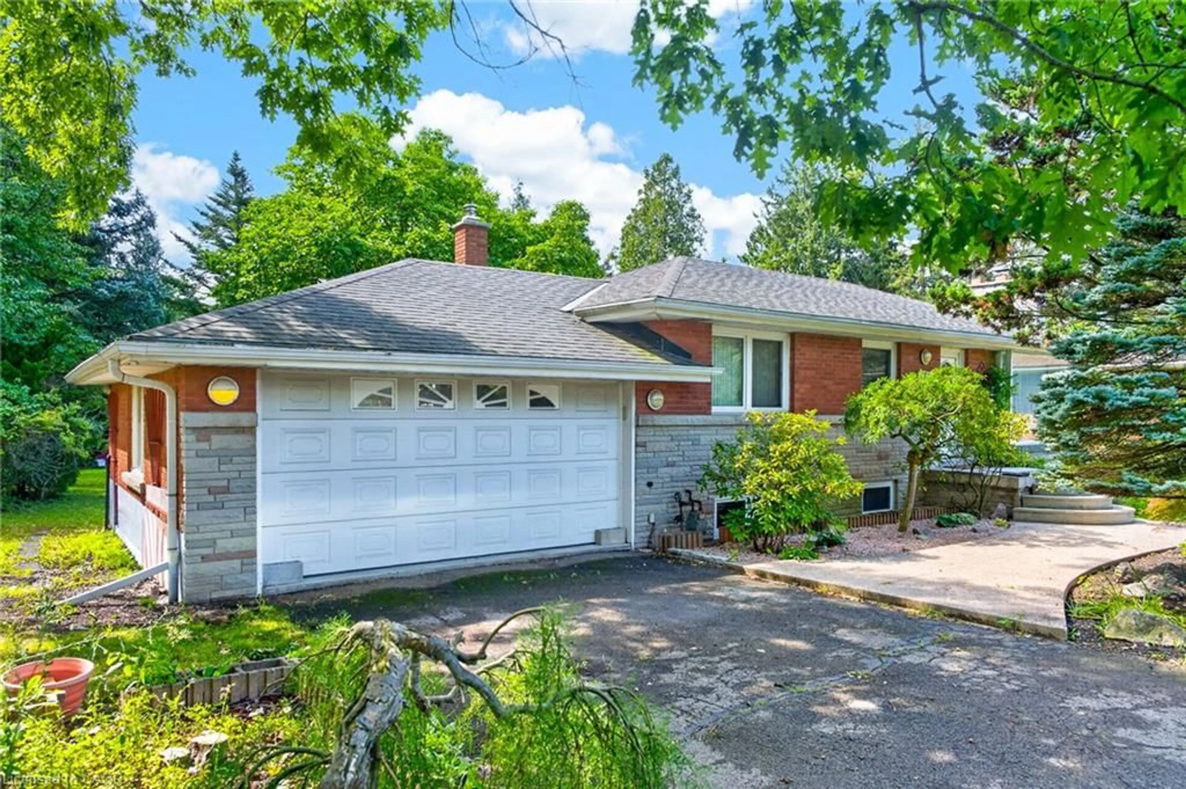 Home with brick exterior material, street for 170 Mohawk Rd, Ancaster Ontario L0G 2W9