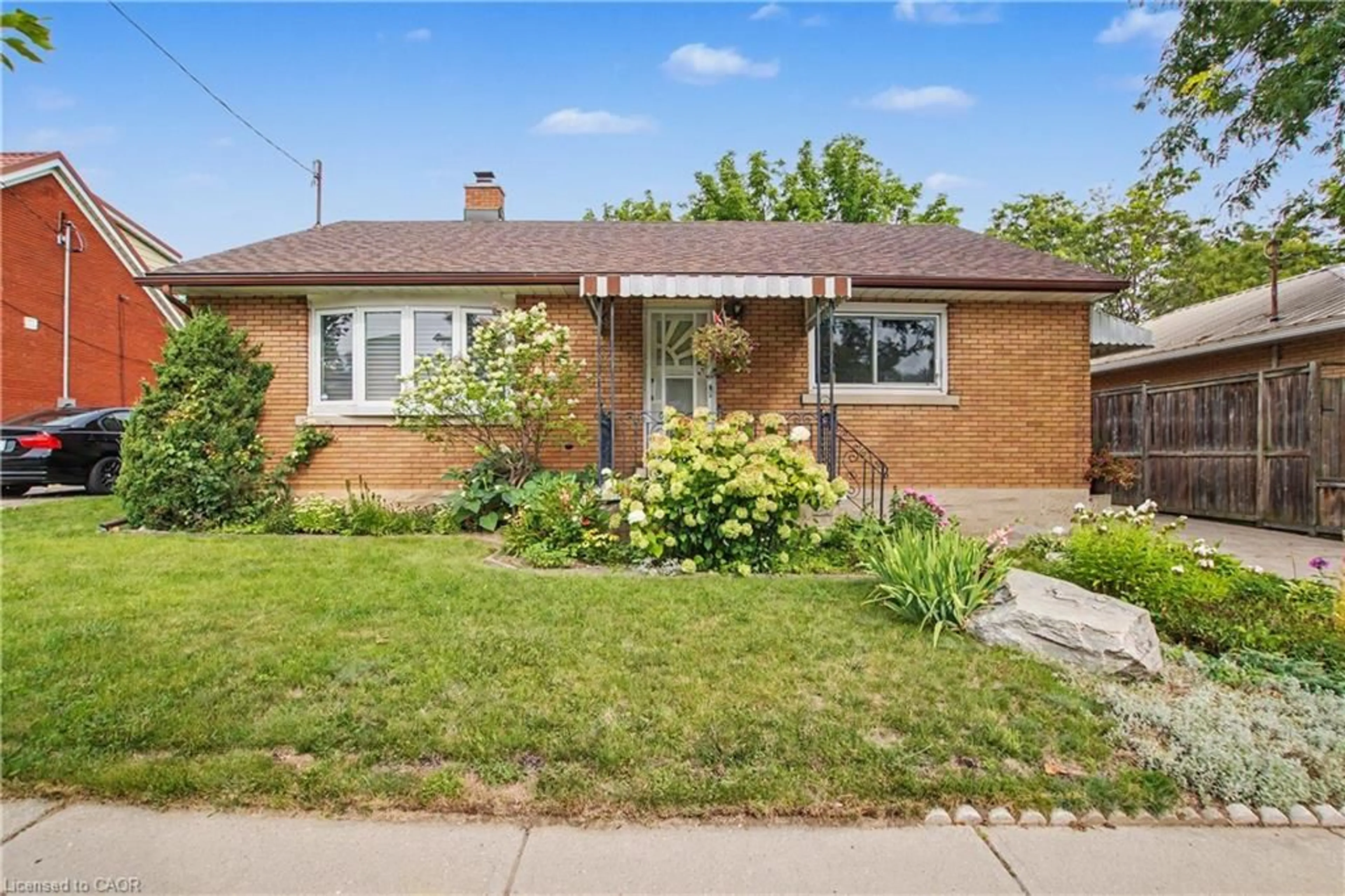 Home with brick exterior material, street for 240 Guelph St, Kitchener Ontario N2H 5X1