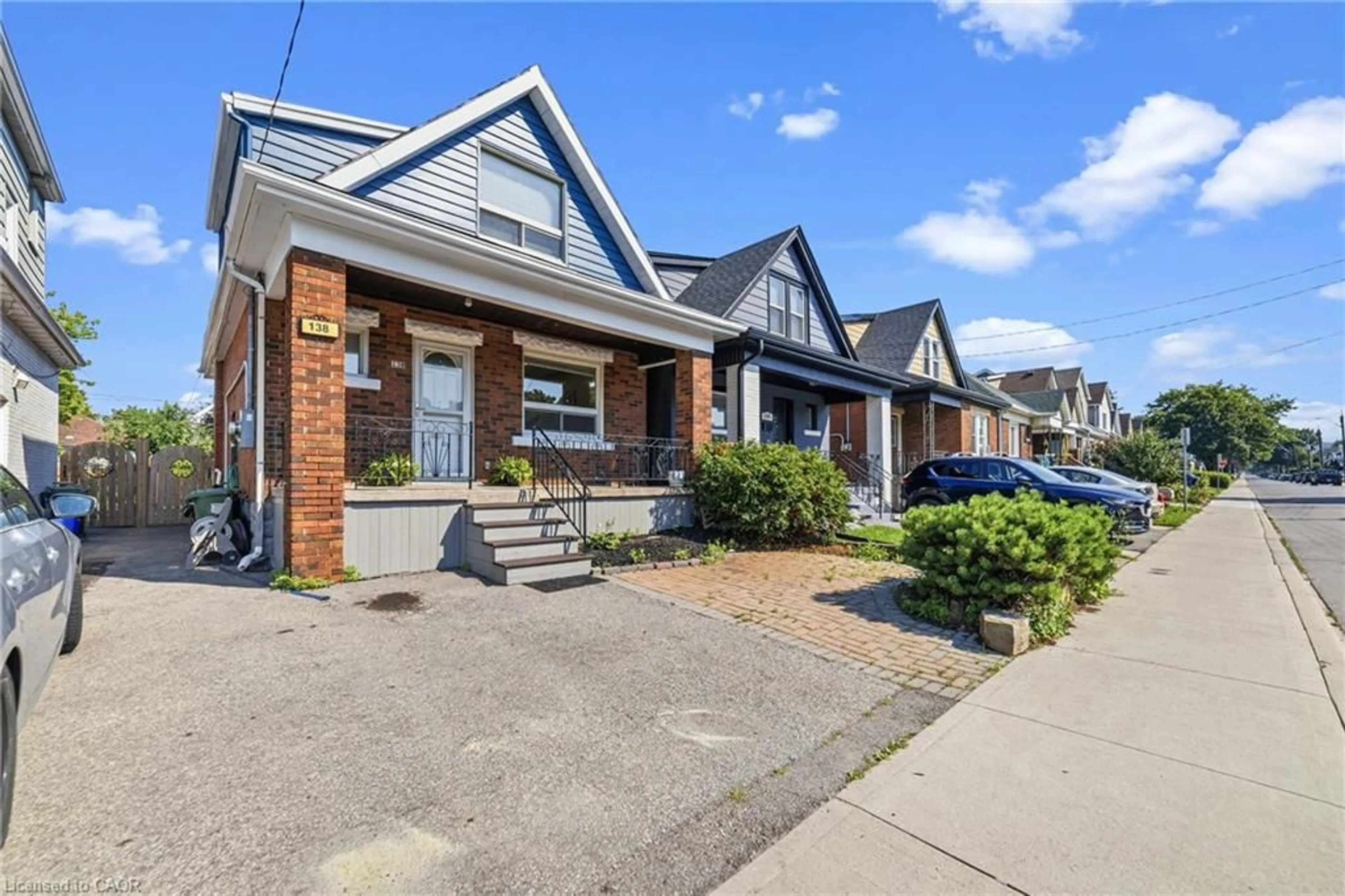Home with brick exterior material, street for 138 Cameron Ave, Hamilton Ontario L8H 4Z3
