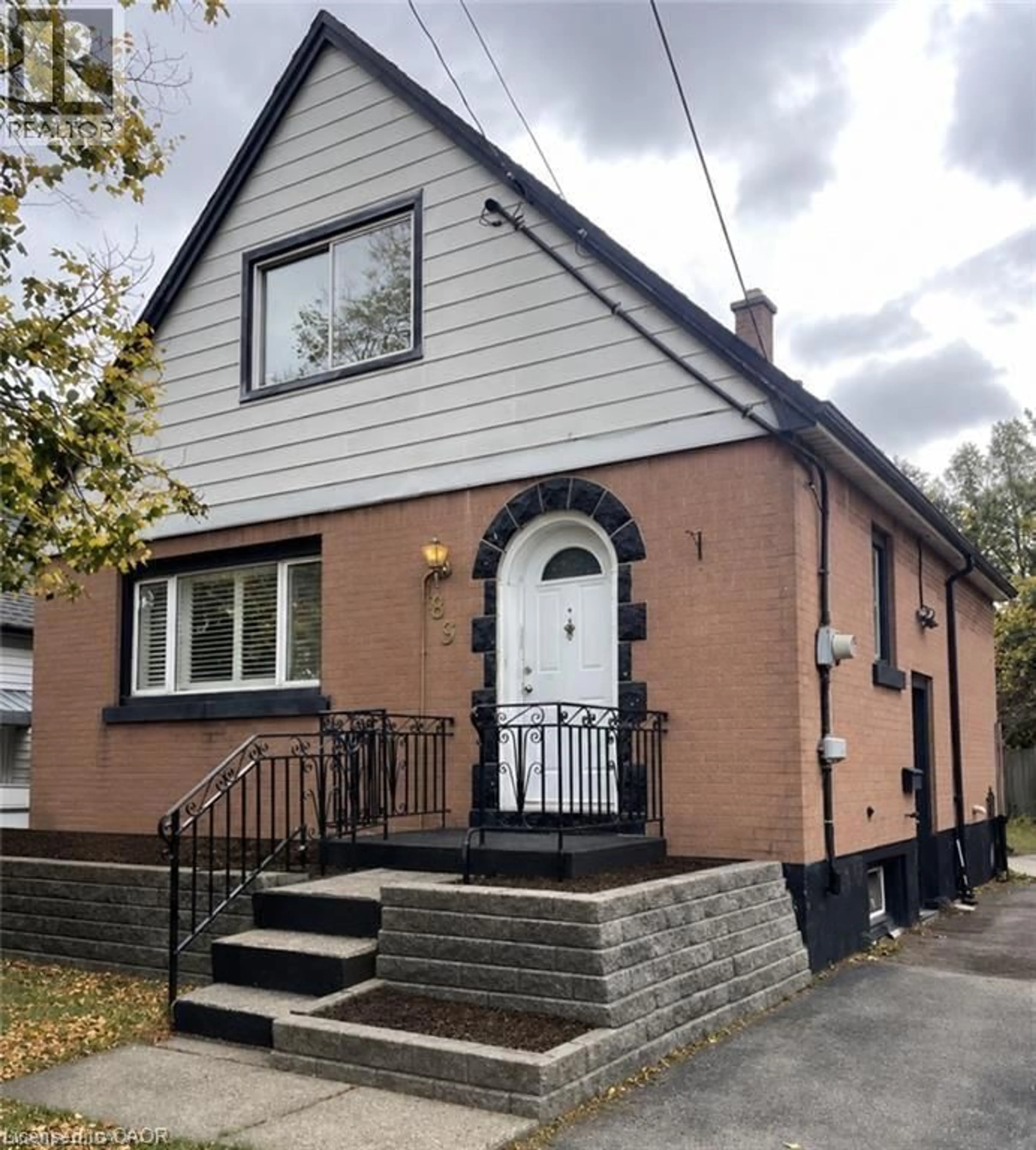 Home with vinyl exterior material, street for 83 East 41st St, Hamilton Ontario L8T 2Z5
