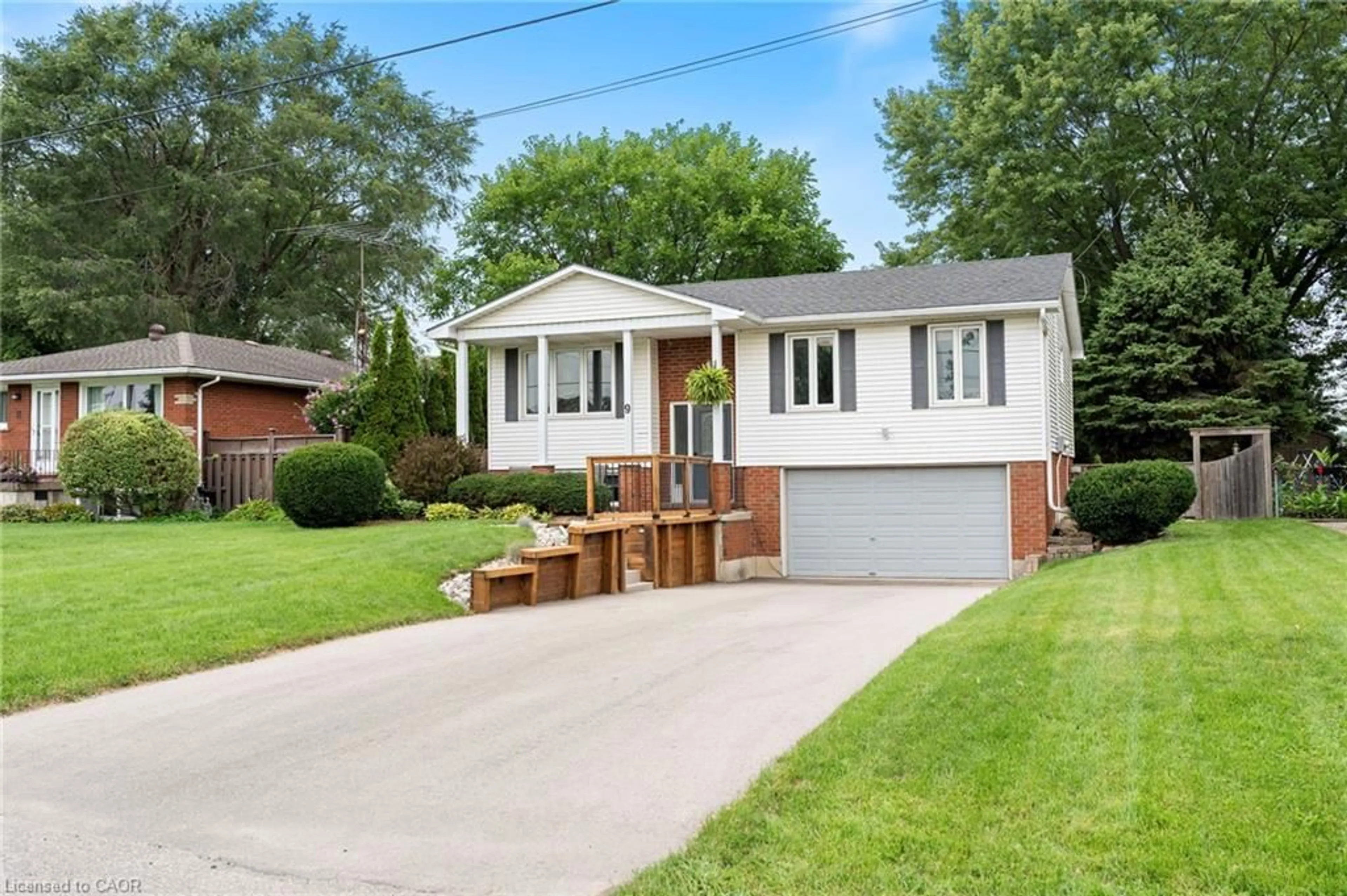Home with vinyl exterior material, street for 9 Kelly Dr, Port Dover Ontario N0A 1N5