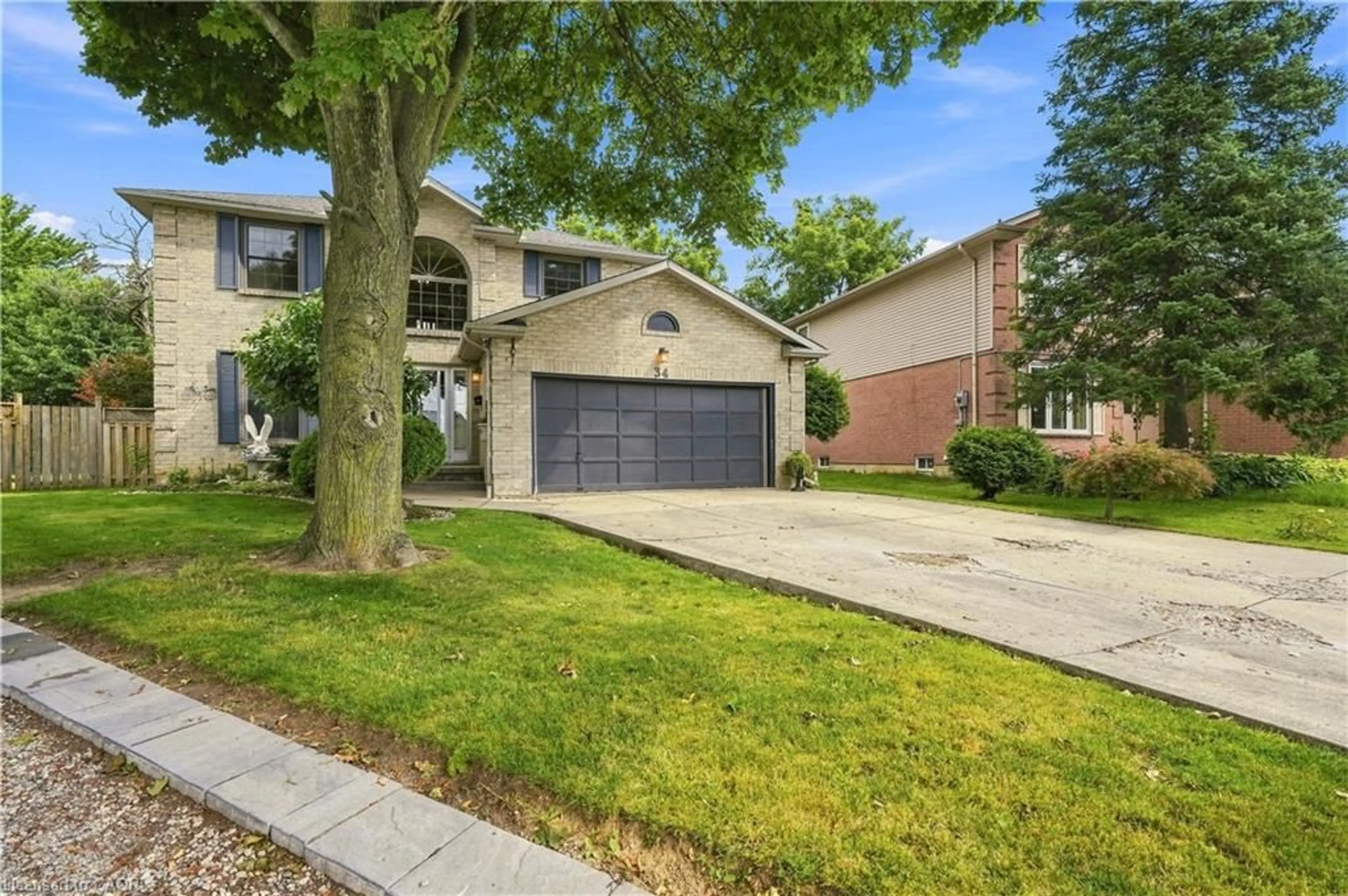 Home with brick exterior material, street for 34 Lisajane Crt, Hamilton Ontario L9B 2N6