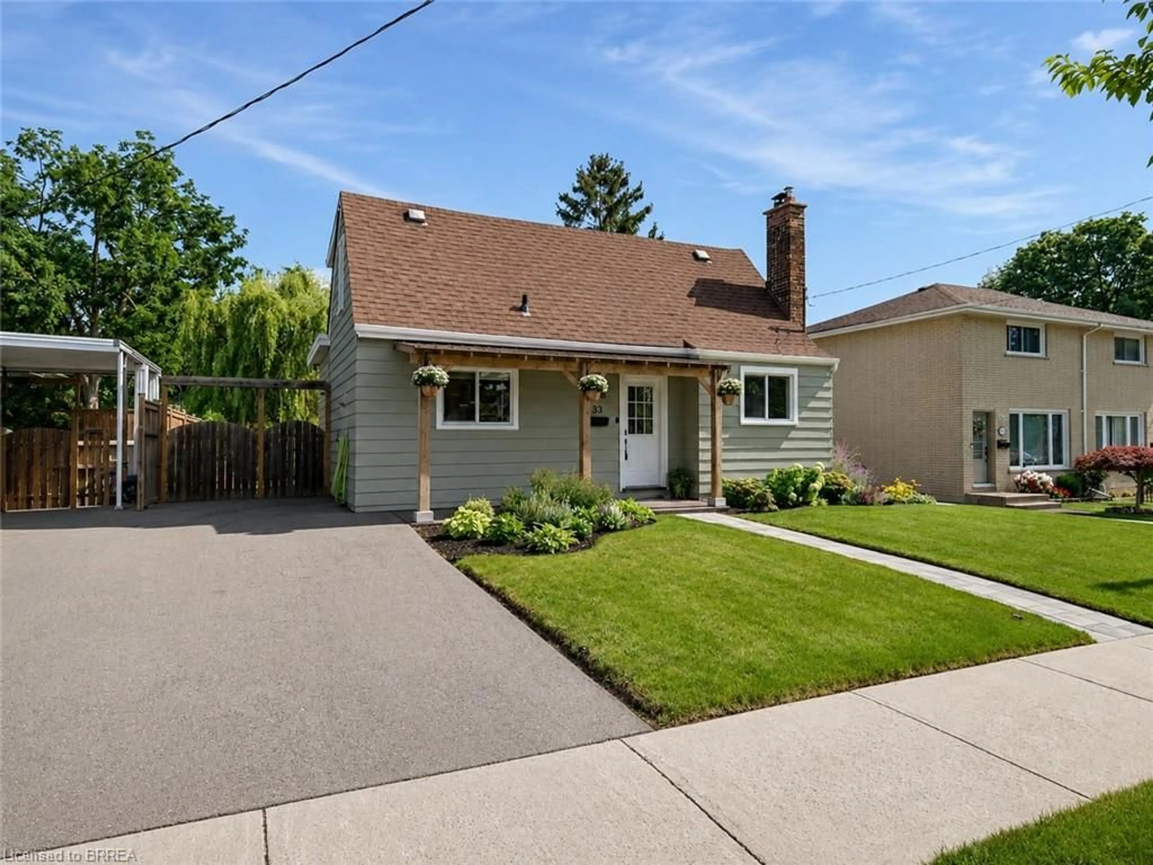 Home with brick exterior material, street for 33 Wood St, Brantford Ontario N3R 2K7