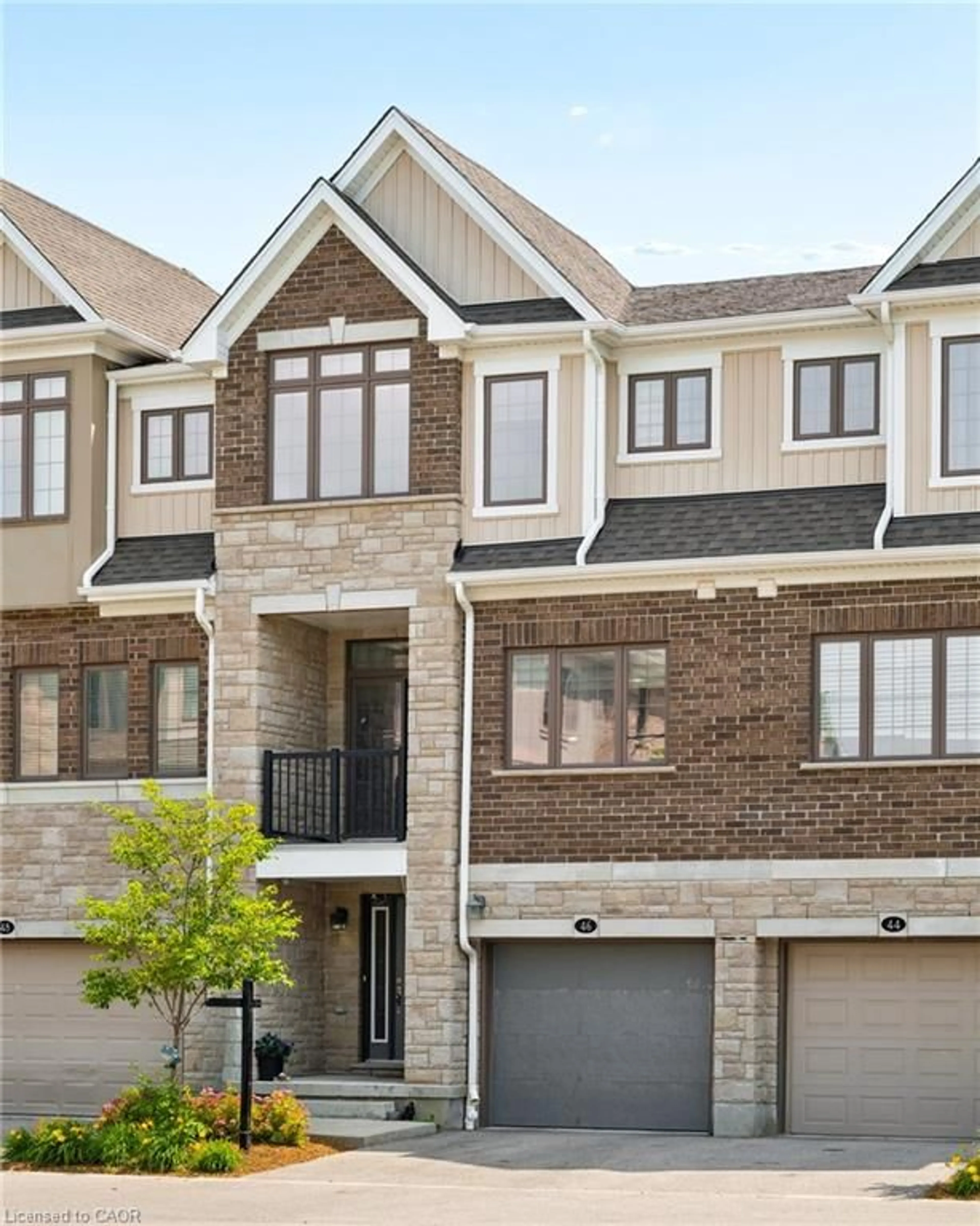 Home with brick exterior material, street for 46 Bank Swallow Cres, Kitchener Ontario N2P 0J7