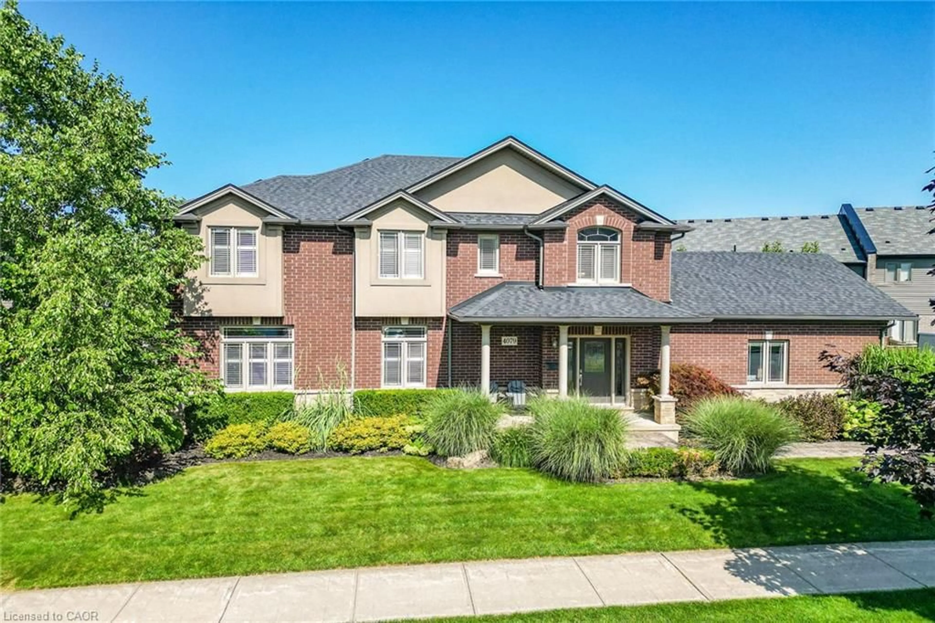 Home with brick exterior material, street for 4079 Stadelbauer Dr, Beamsville Ontario L3J 0M4