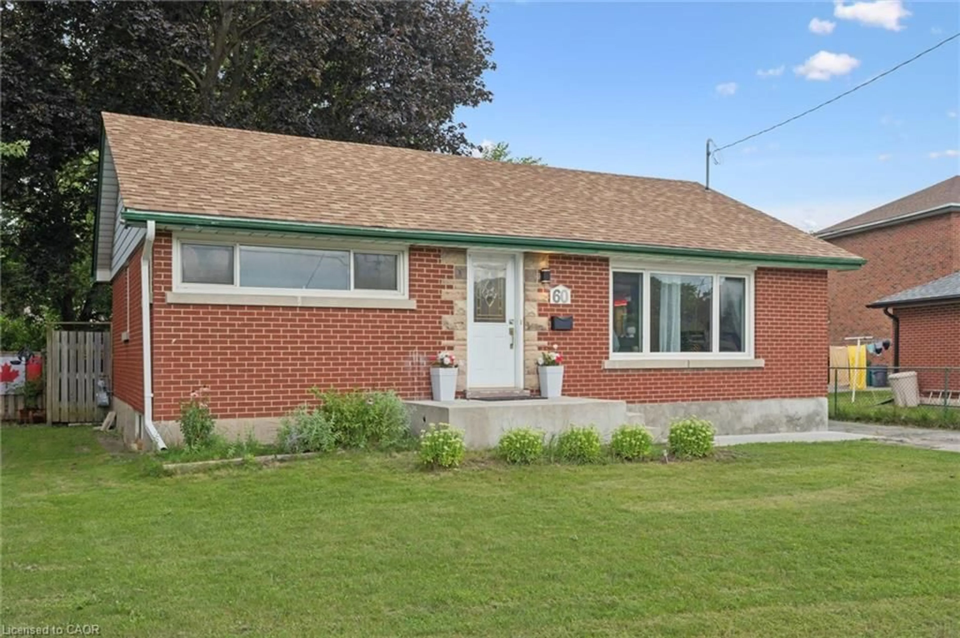 Home with brick exterior material, street for 60 Edinburgh Rd, Kitchener Ontario N2B 1M5