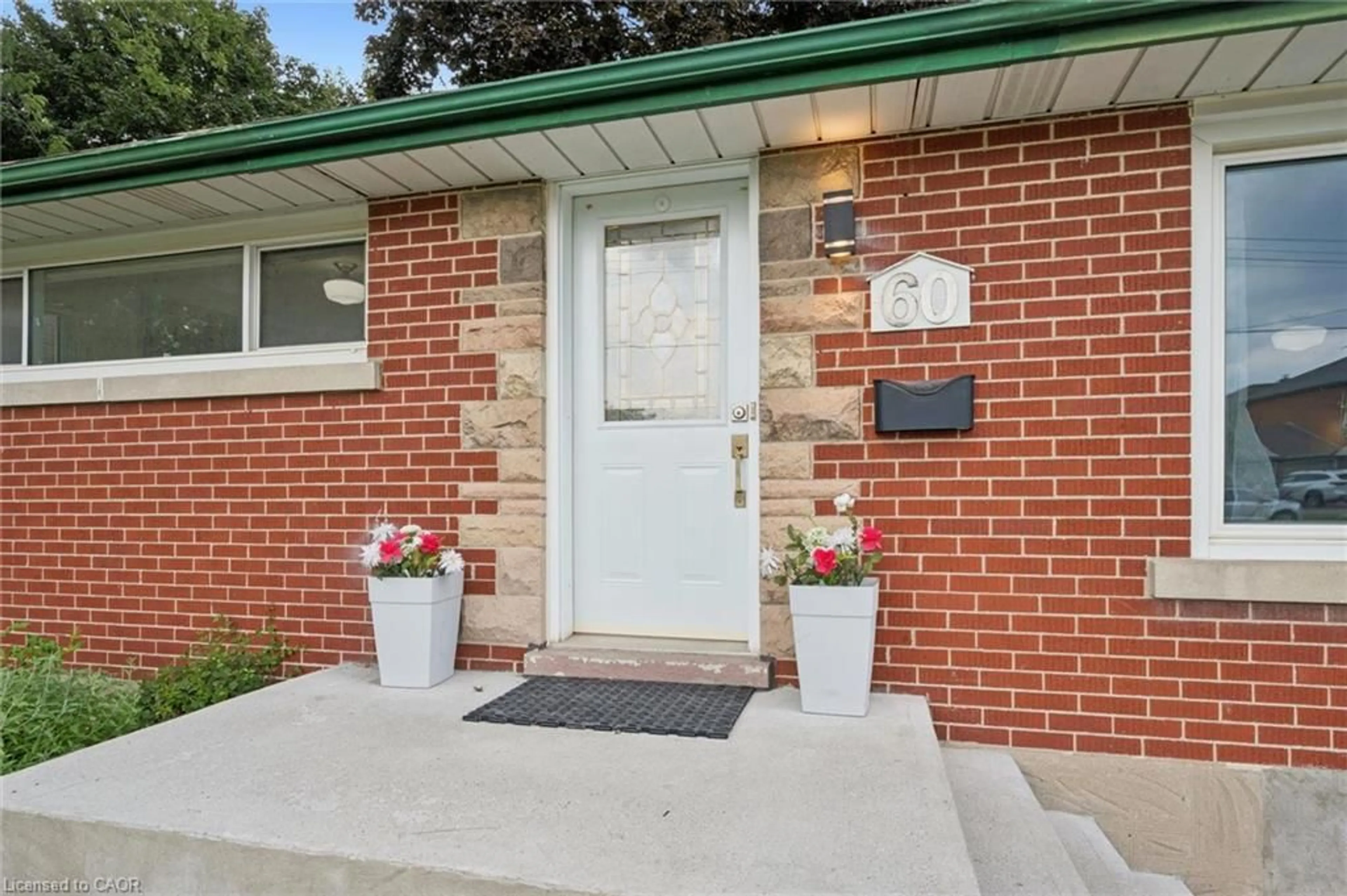Home with brick exterior material, street for 60 Edinburgh Rd, Kitchener Ontario N2B 1M5