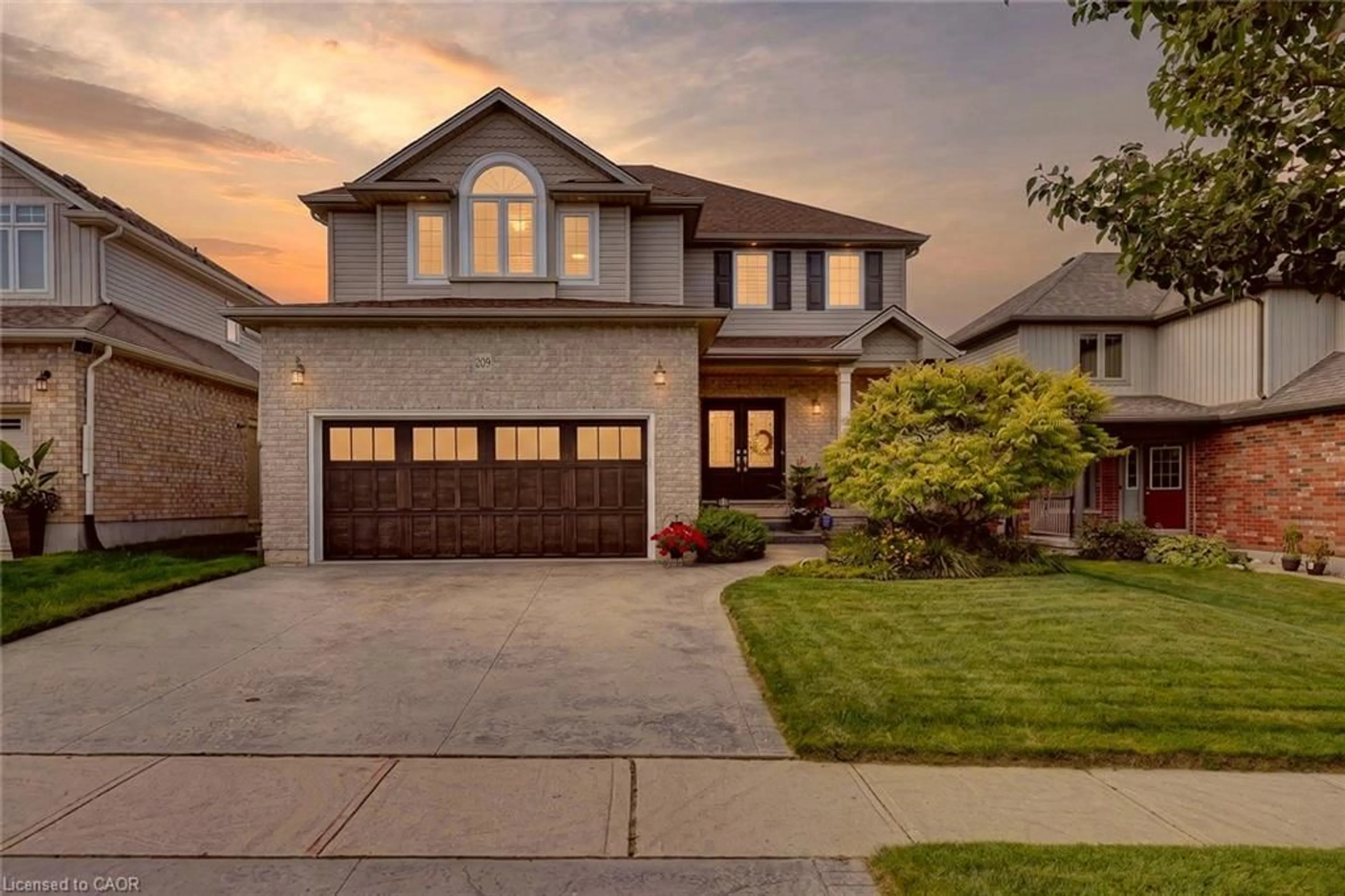 Home with brick exterior material, street for 209 Munnoch Blvd, Woodstock Ontario N4T 1V7