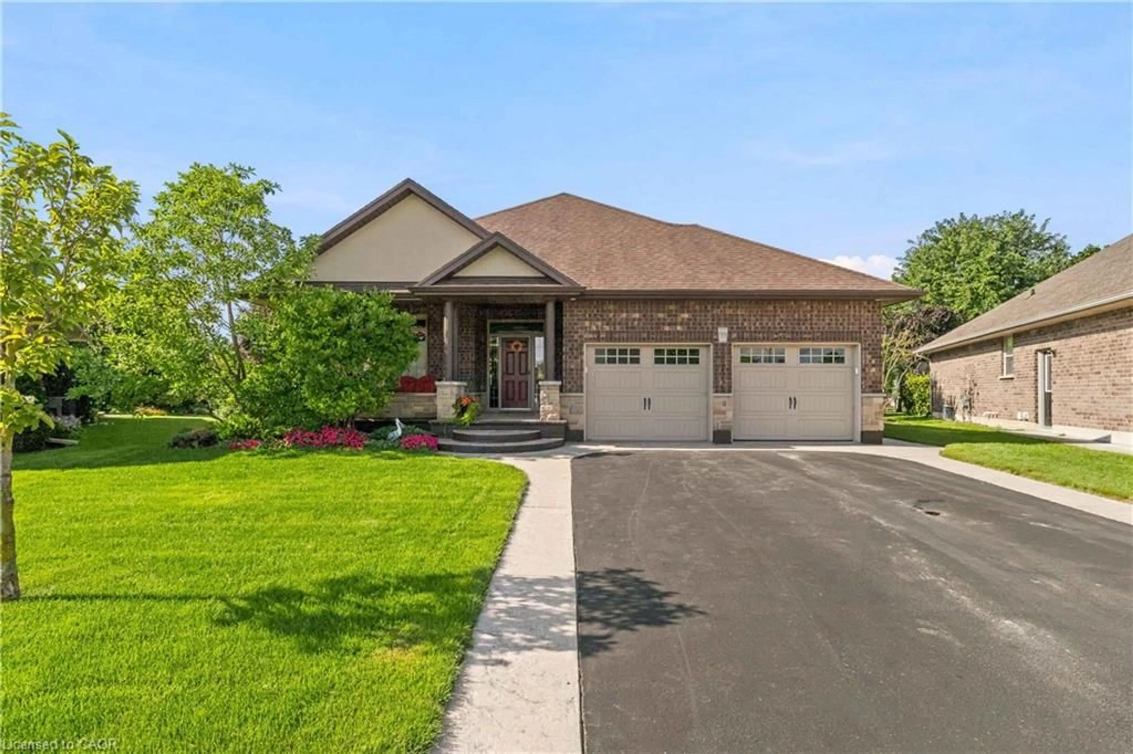 Home with brick exterior material, street for 99 Magnolia Dr, Port Dover Ontario N0A 1N6