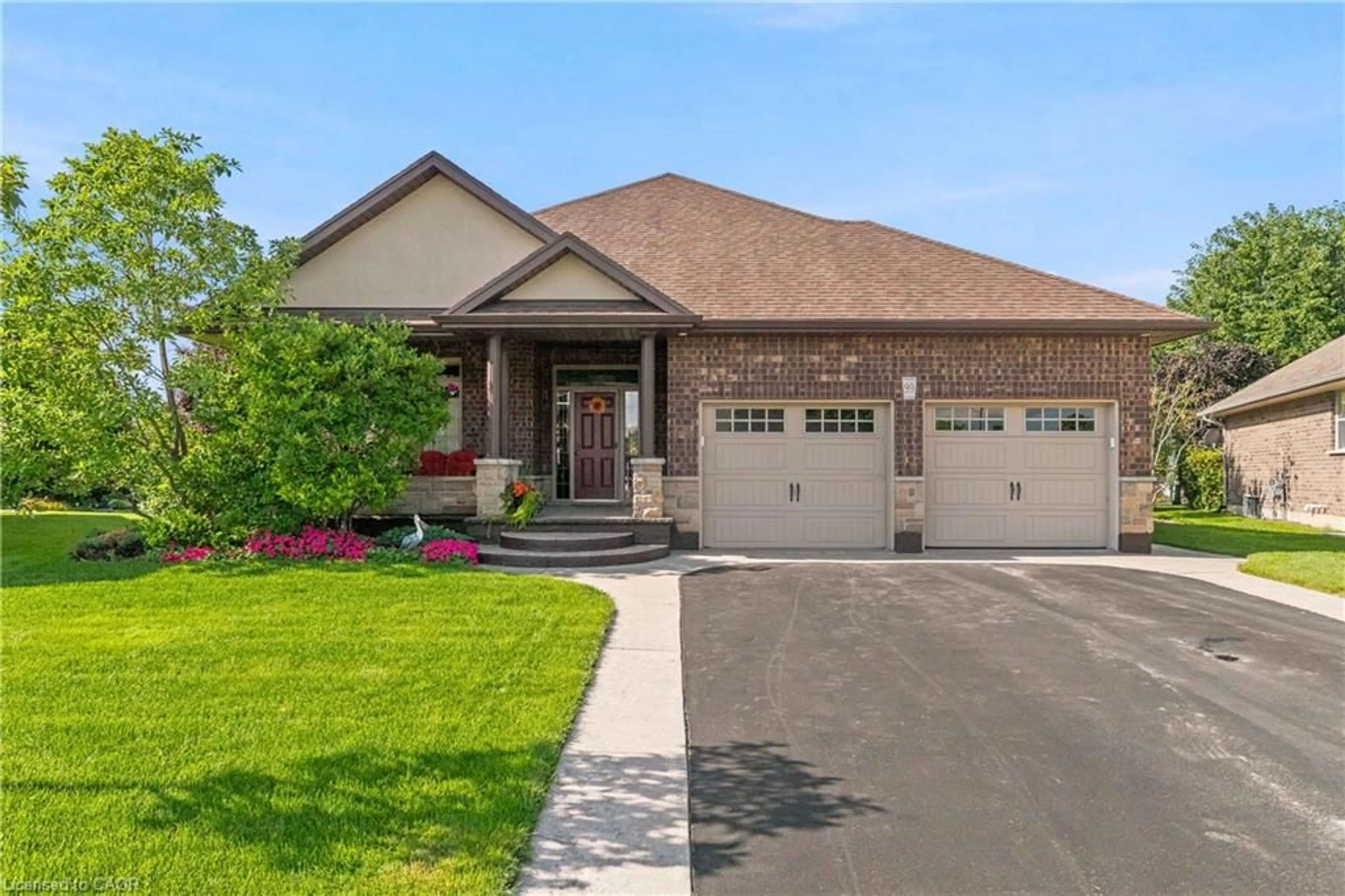 Home with brick exterior material, street for 99 Magnolia Dr, Port Dover Ontario N0A 1N6