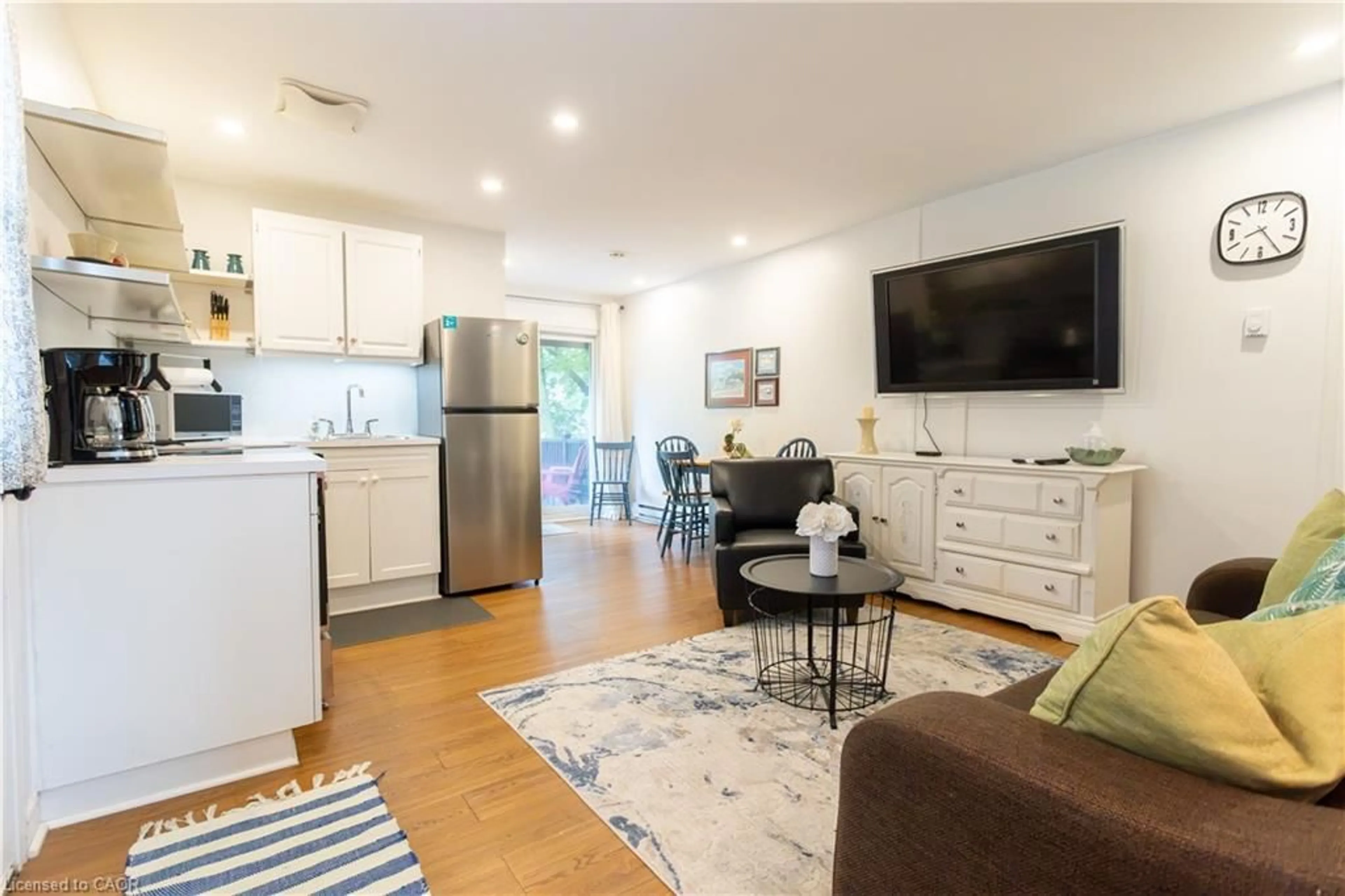 Open concept kitchen, wood/laminate floor for 46 John St, Port Dover Ontario N0A 1N7