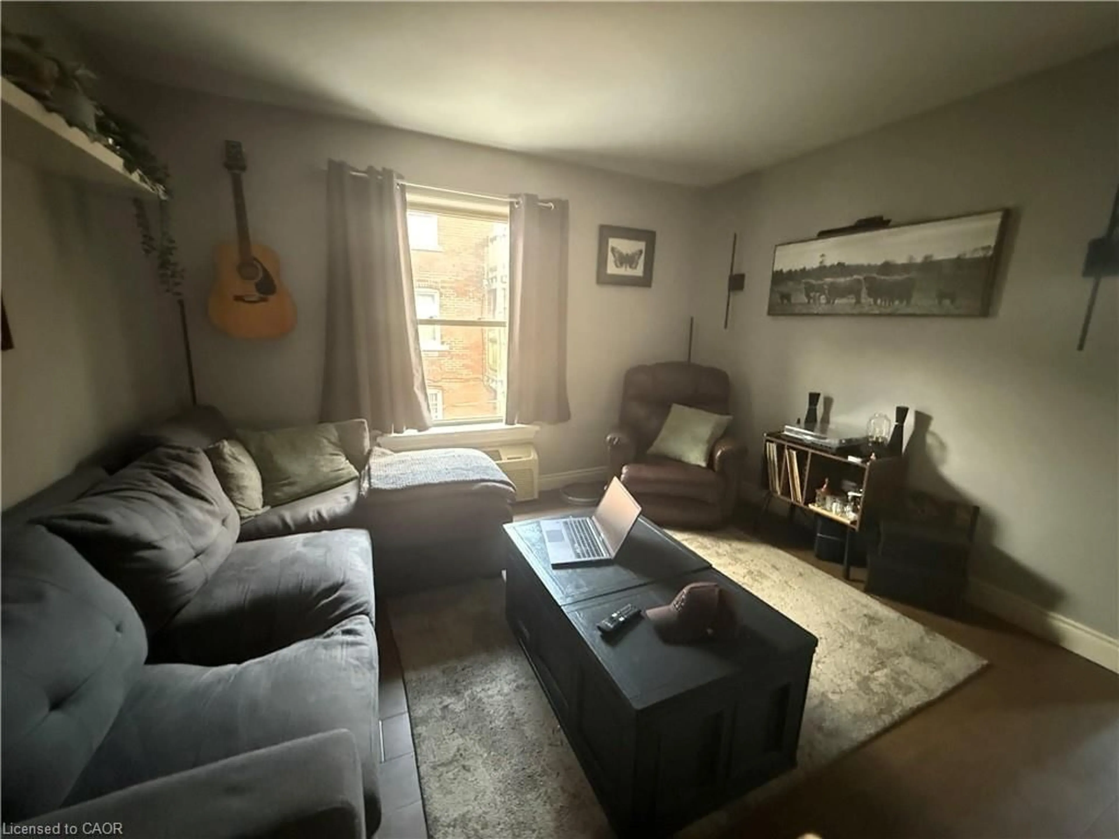 Living room with furniture, unknown for 947 Main St #2, Hamilton Ontario L8M 1M9
