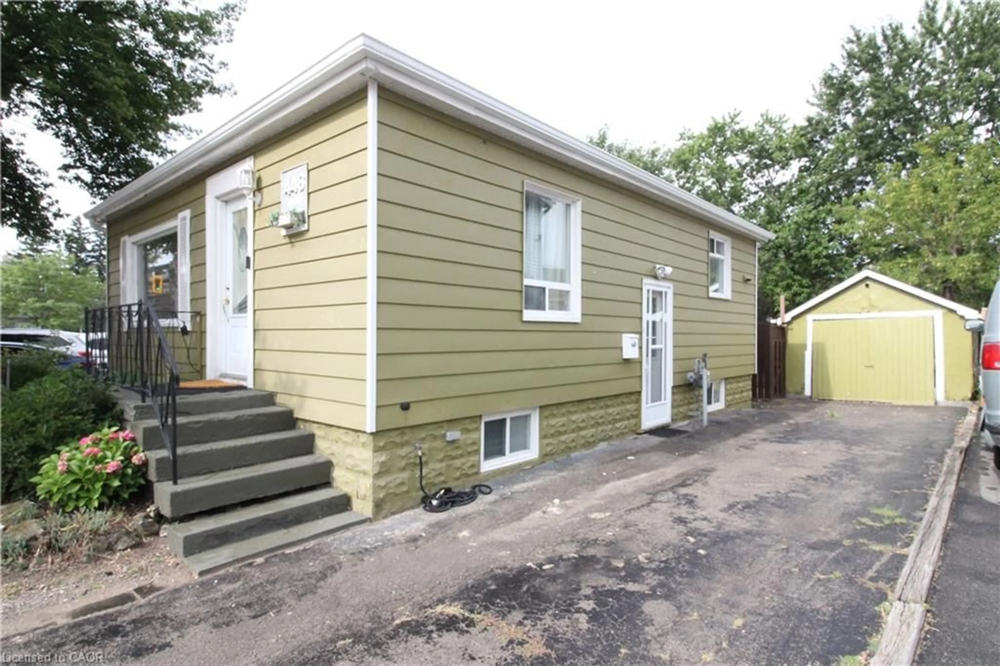 Home with vinyl exterior material, street for 446 Upper Gage Ave, Hamilton Ontario L8V 4H9