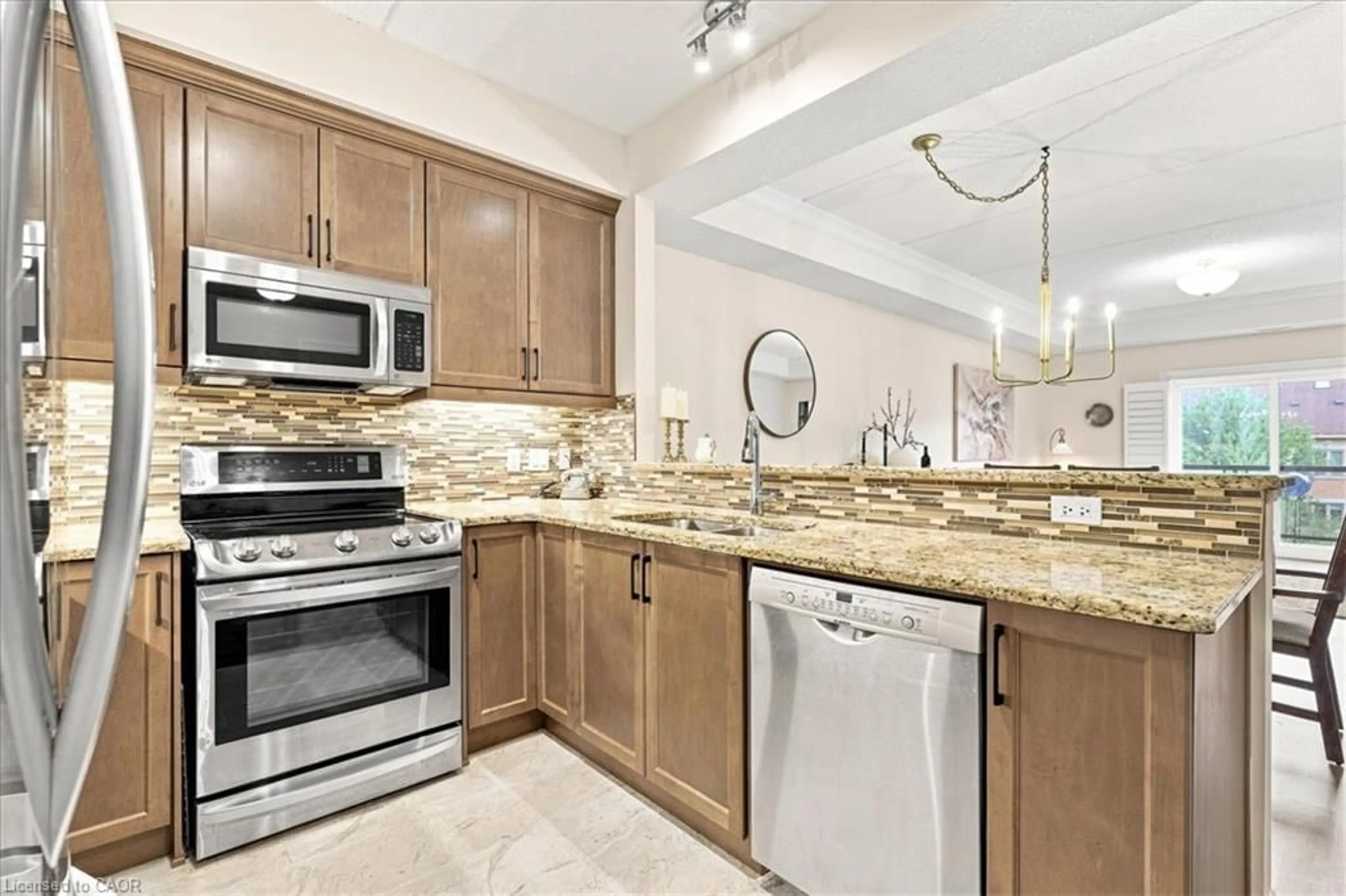 Open concept kitchen, ceramic/tile floor for 23 Stumpf St #206, Elora Ontario N0B 1S0