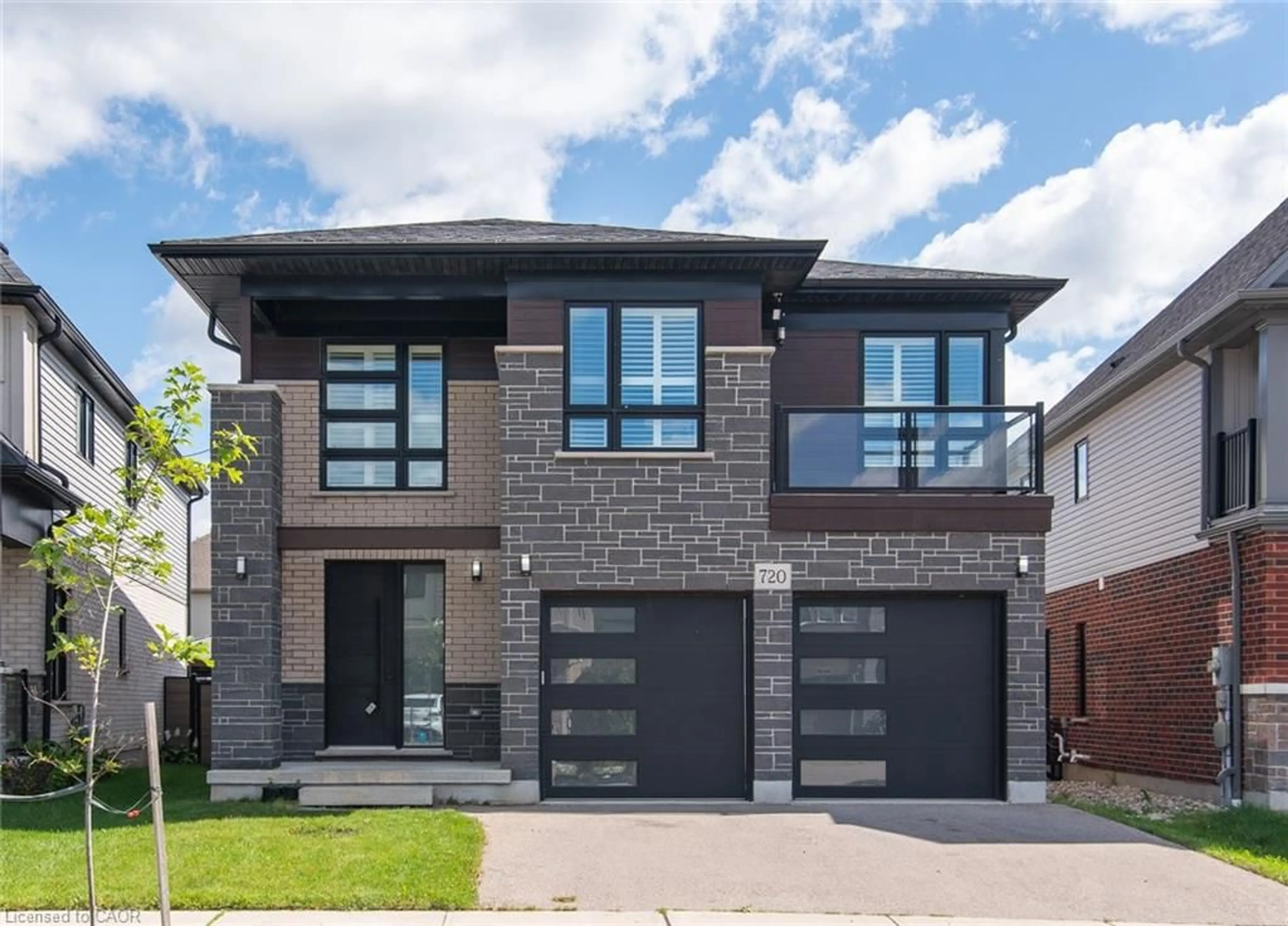 Home with brick exterior material, street for 720 Wood Lily St, Waterloo Ontario N2V 0G1