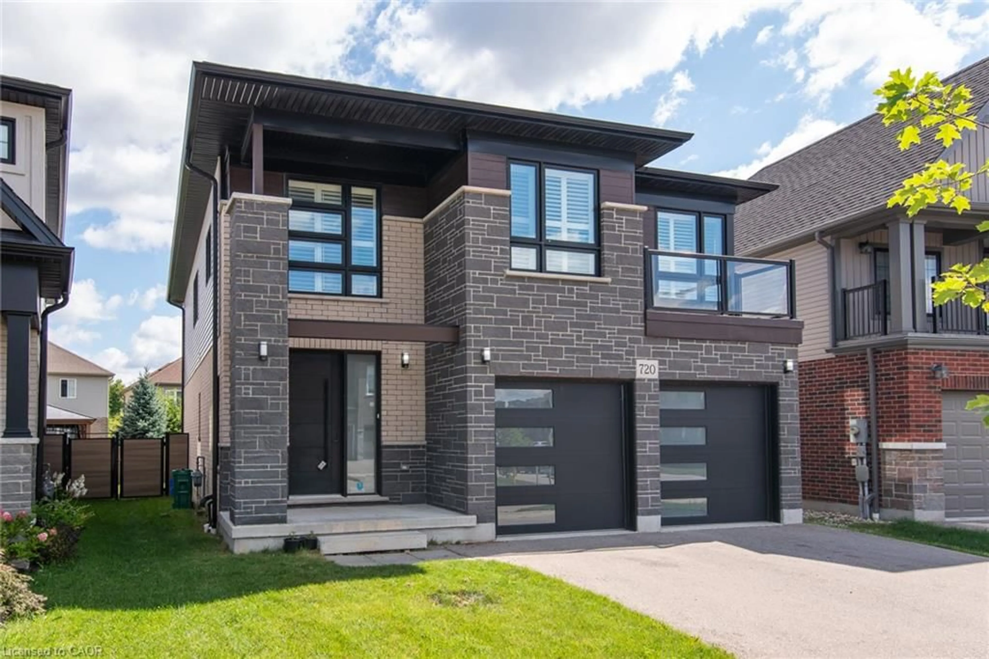 Home with brick exterior material, street for 720 Wood Lily St, Waterloo Ontario N2V 0G1