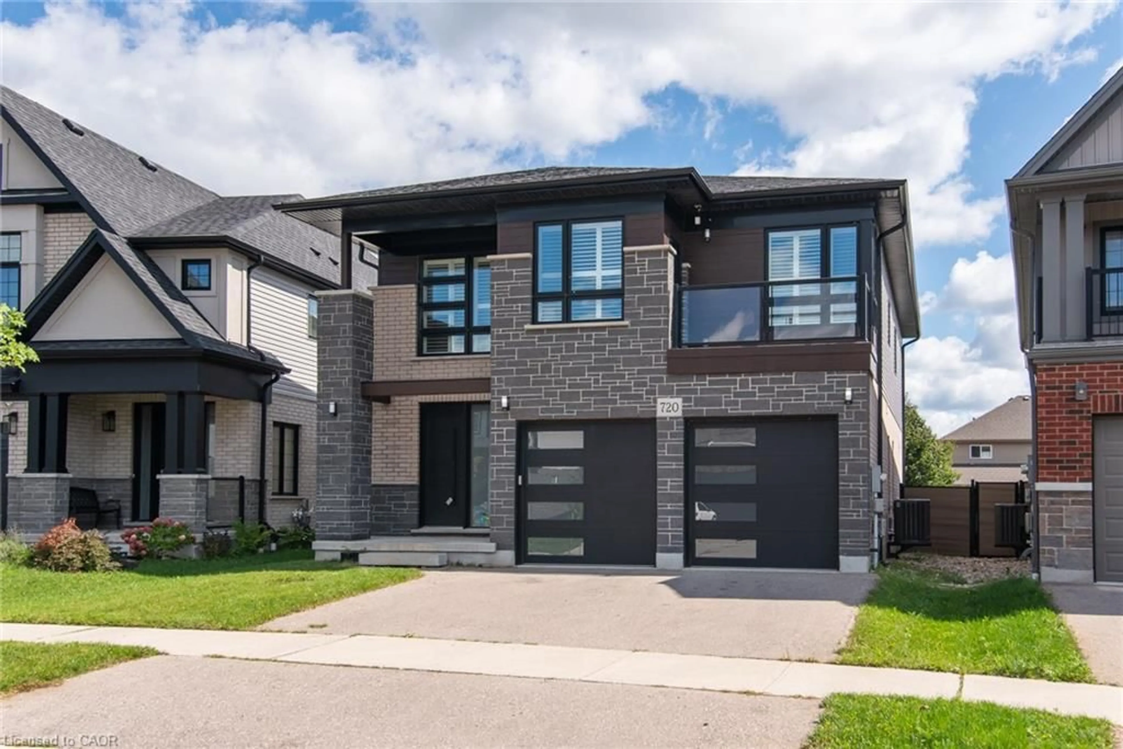 Home with brick exterior material, street for 720 Wood Lily St, Waterloo Ontario N2V 0G1