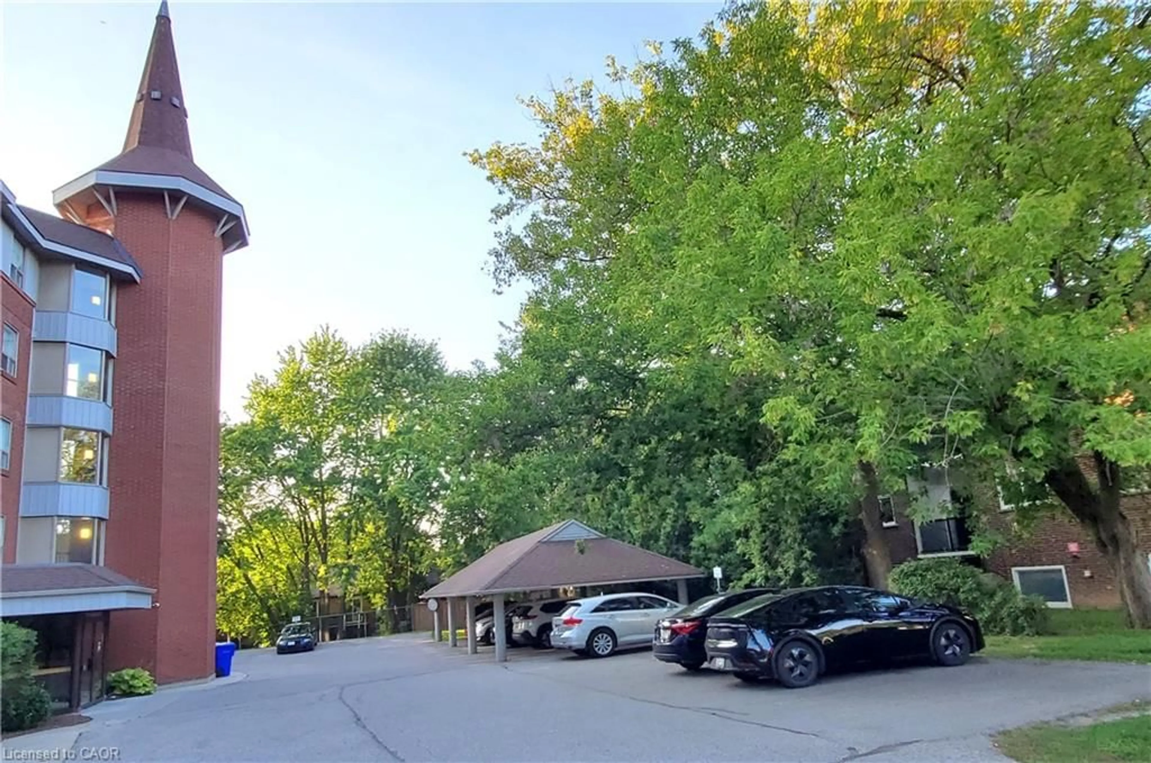 A pic from outside/outdoor area/front of a property/back of a property/a pic from drone, street for 384 Erb St #306, Waterloo Ontario N2L 1W6