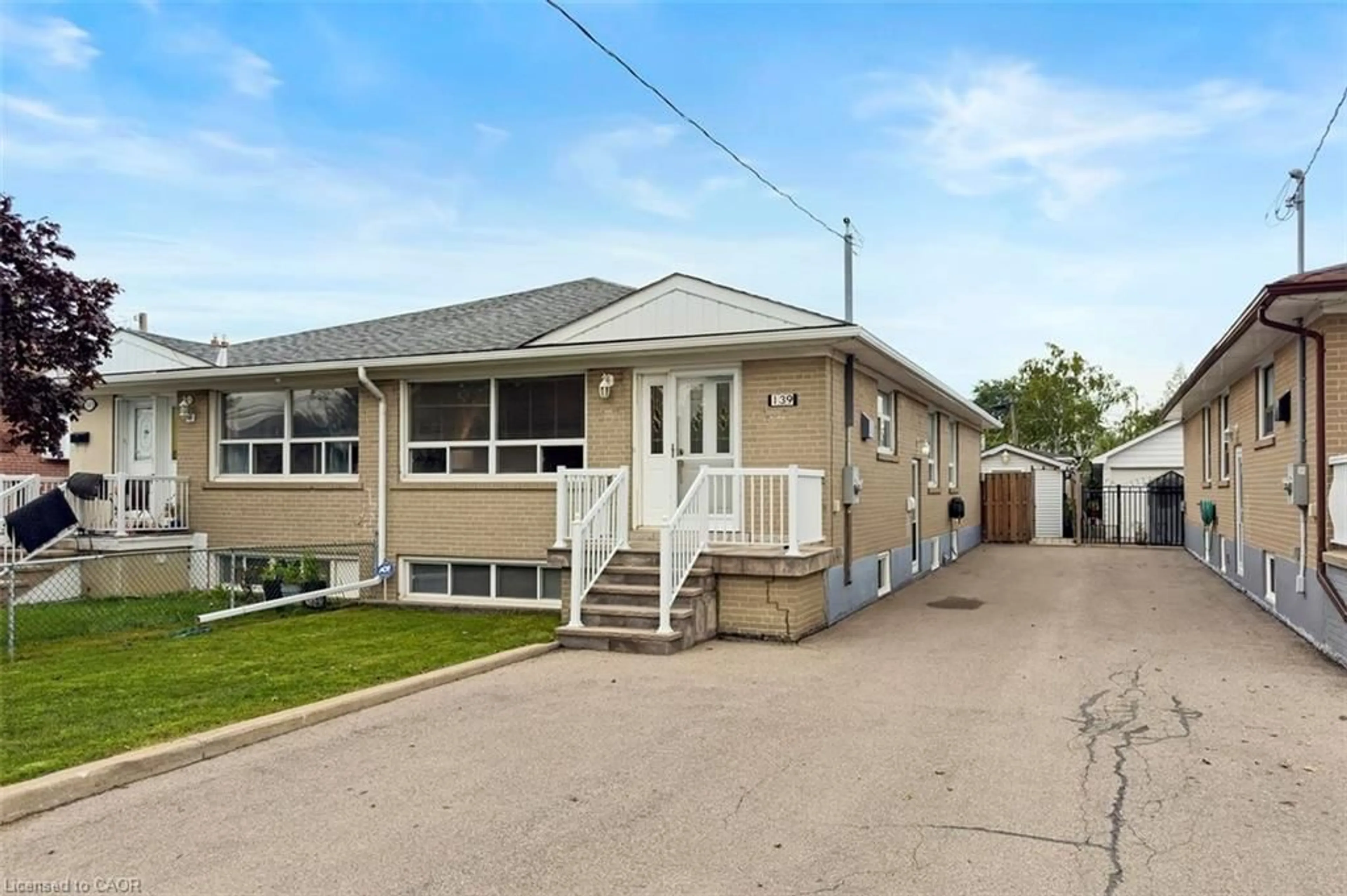 Home with vinyl exterior material, street for 139 Vodden St, Brampton Ontario L6V 1M6