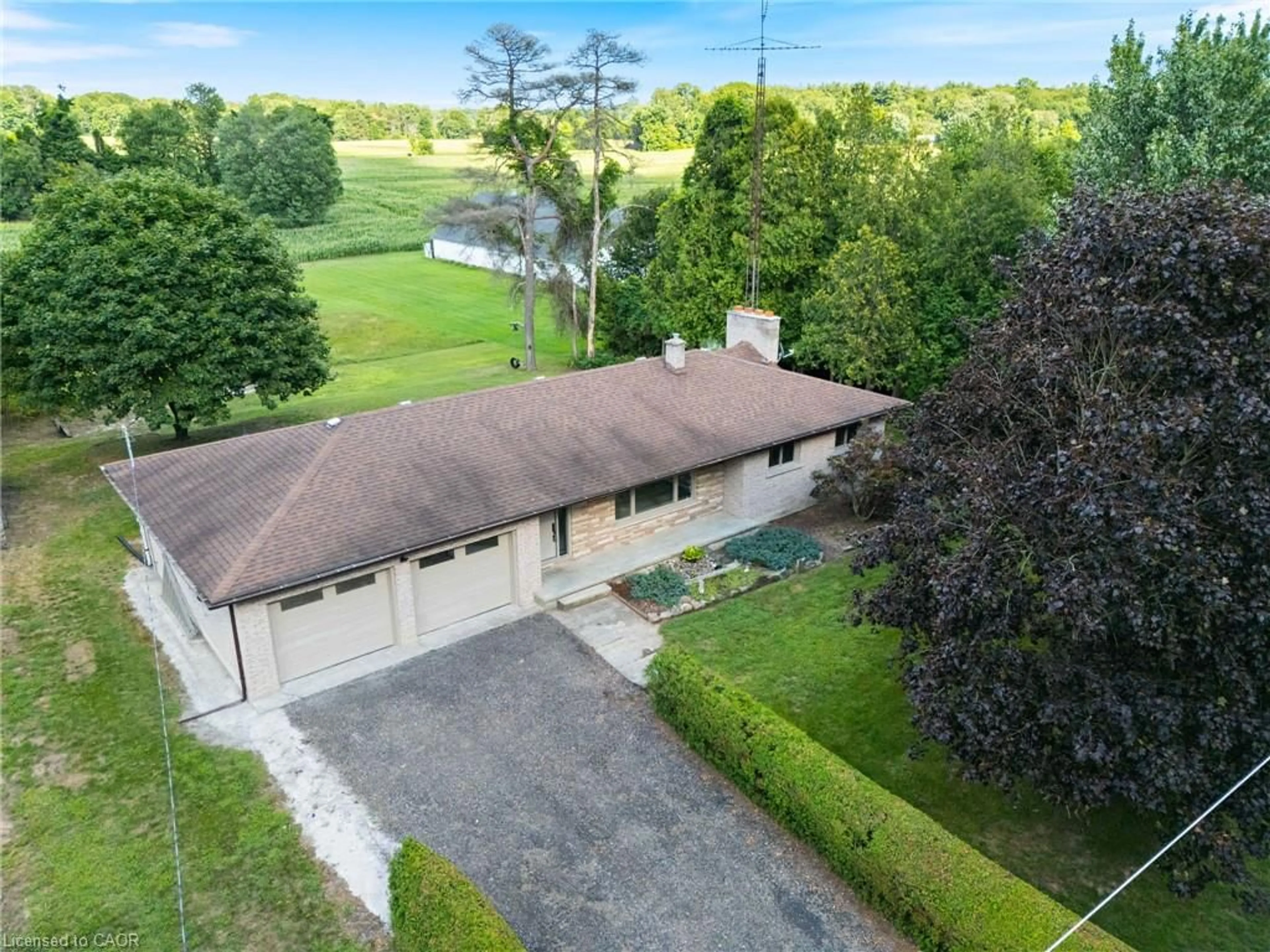 A pic from outside/outdoor area/front of a property/back of a property/a pic from drone, street for 772 Forestry Farm Rd, St. Williams Ontario N0E 1P0