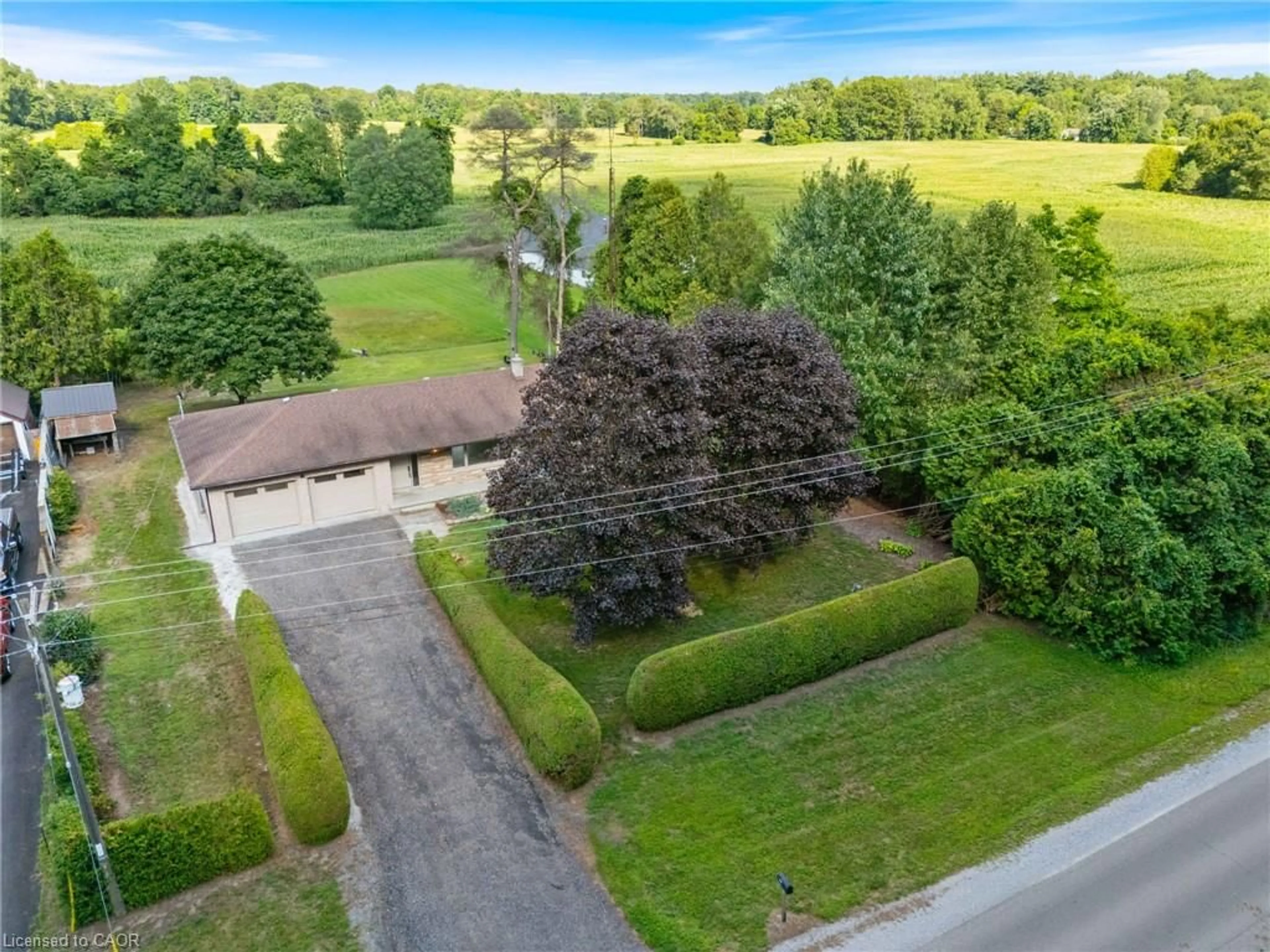 A pic from outside/outdoor area/front of a property/back of a property/a pic from drone, street for 772 Forestry Farm Rd, St. Williams Ontario N0E 1P0