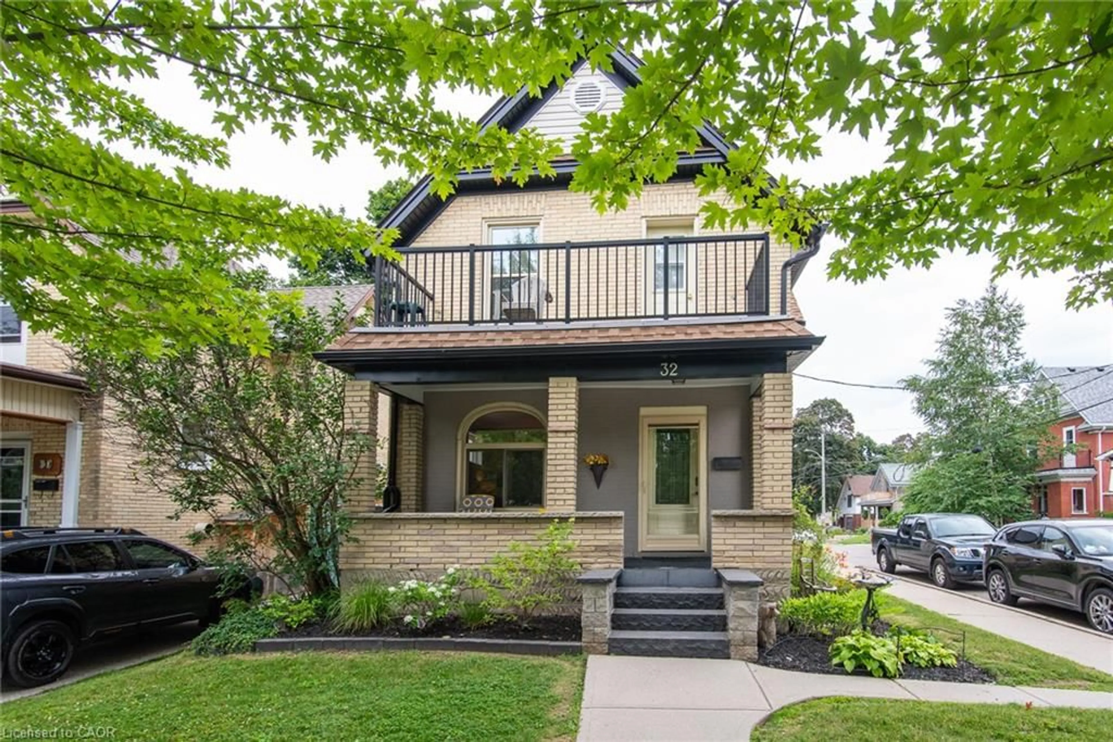 Home with brick exterior material, street for 32 Samuel St, Kitchener Ontario N2H 1P1