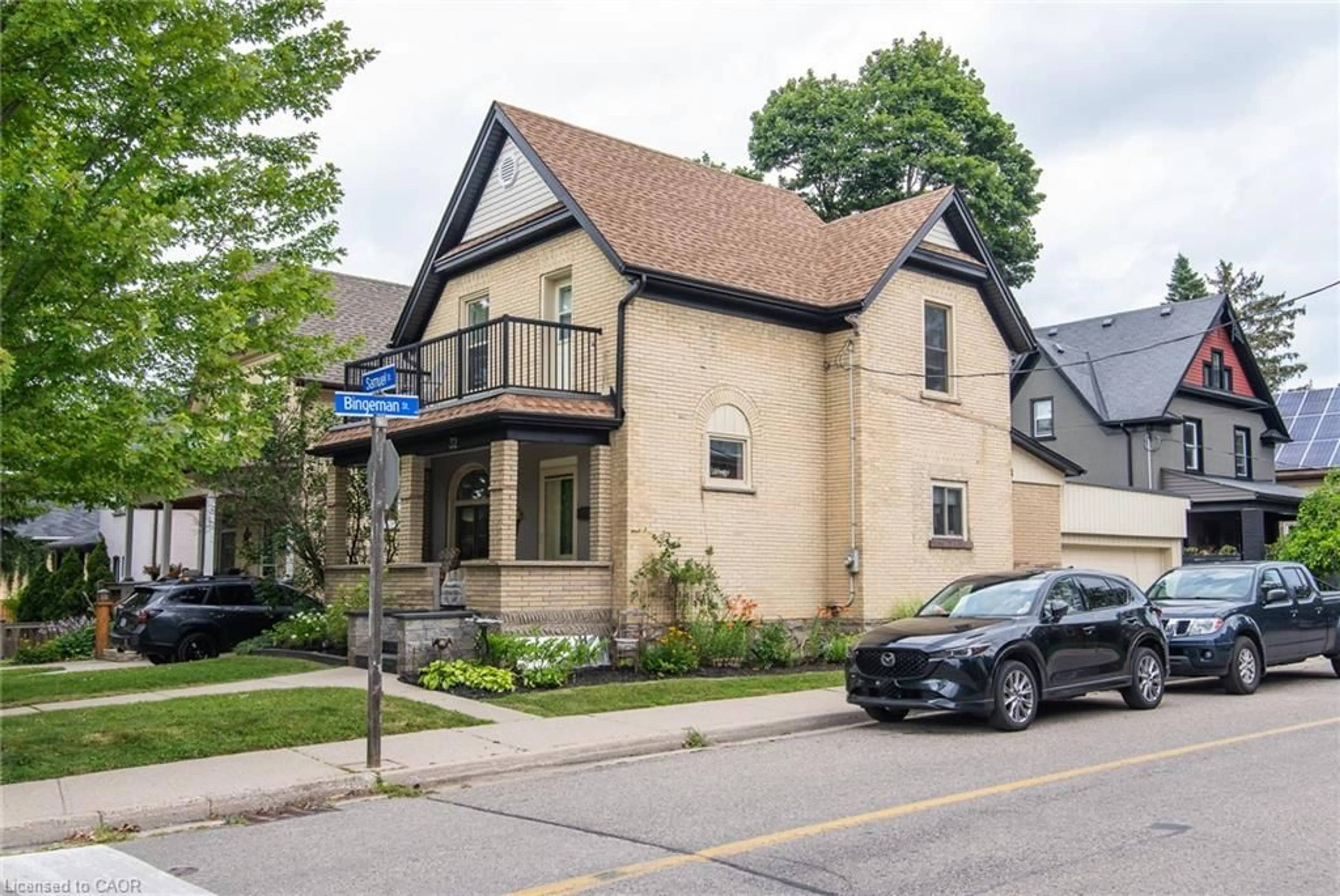 Home with brick exterior material, street for 32 Samuel St, Kitchener Ontario N2H 1P1