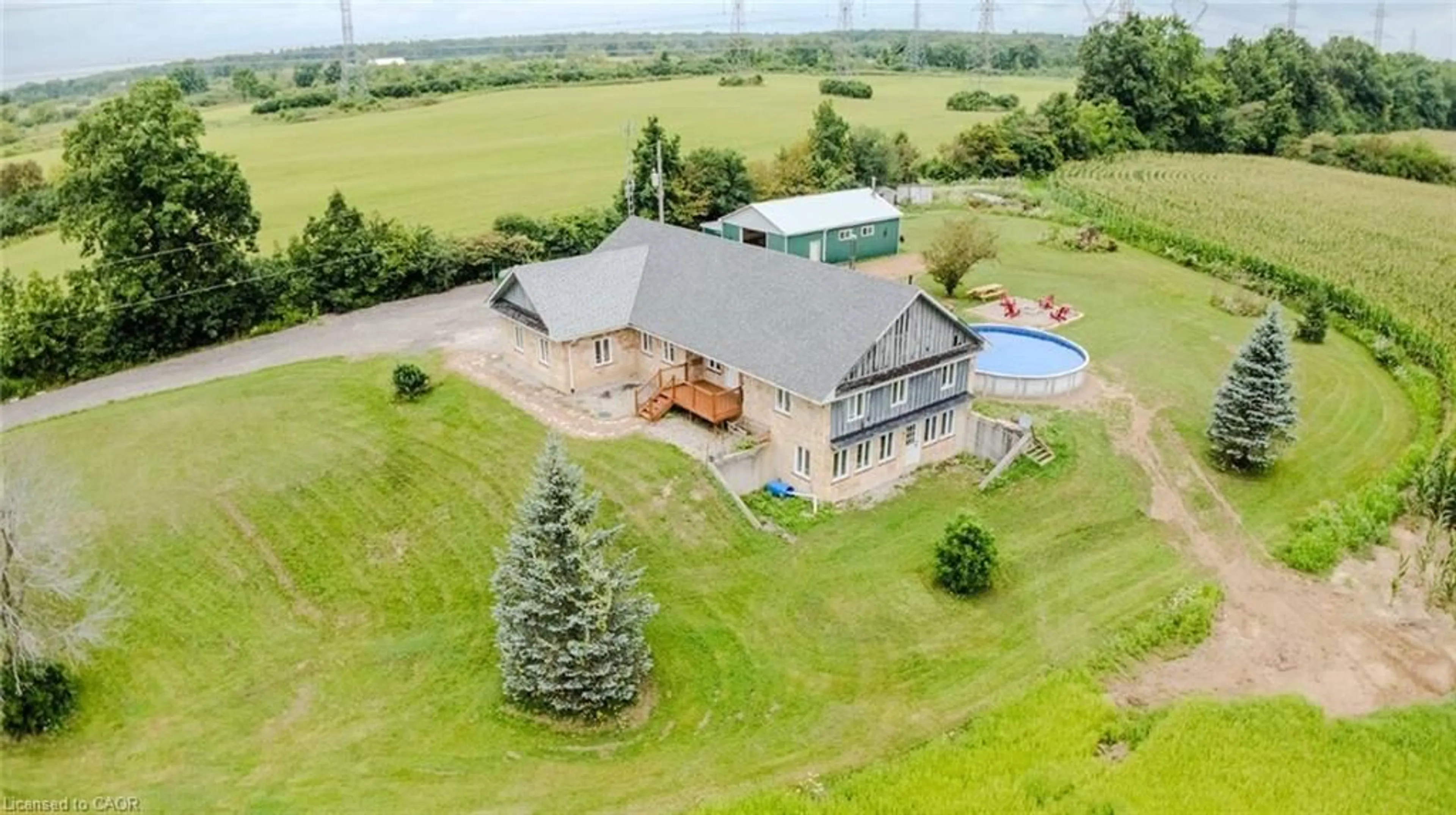 A pic from outside/outdoor area/front of a property/back of a property/a pic from drone, building for 107 6th Line Line, Caledonia Ontario N3W 1Y8