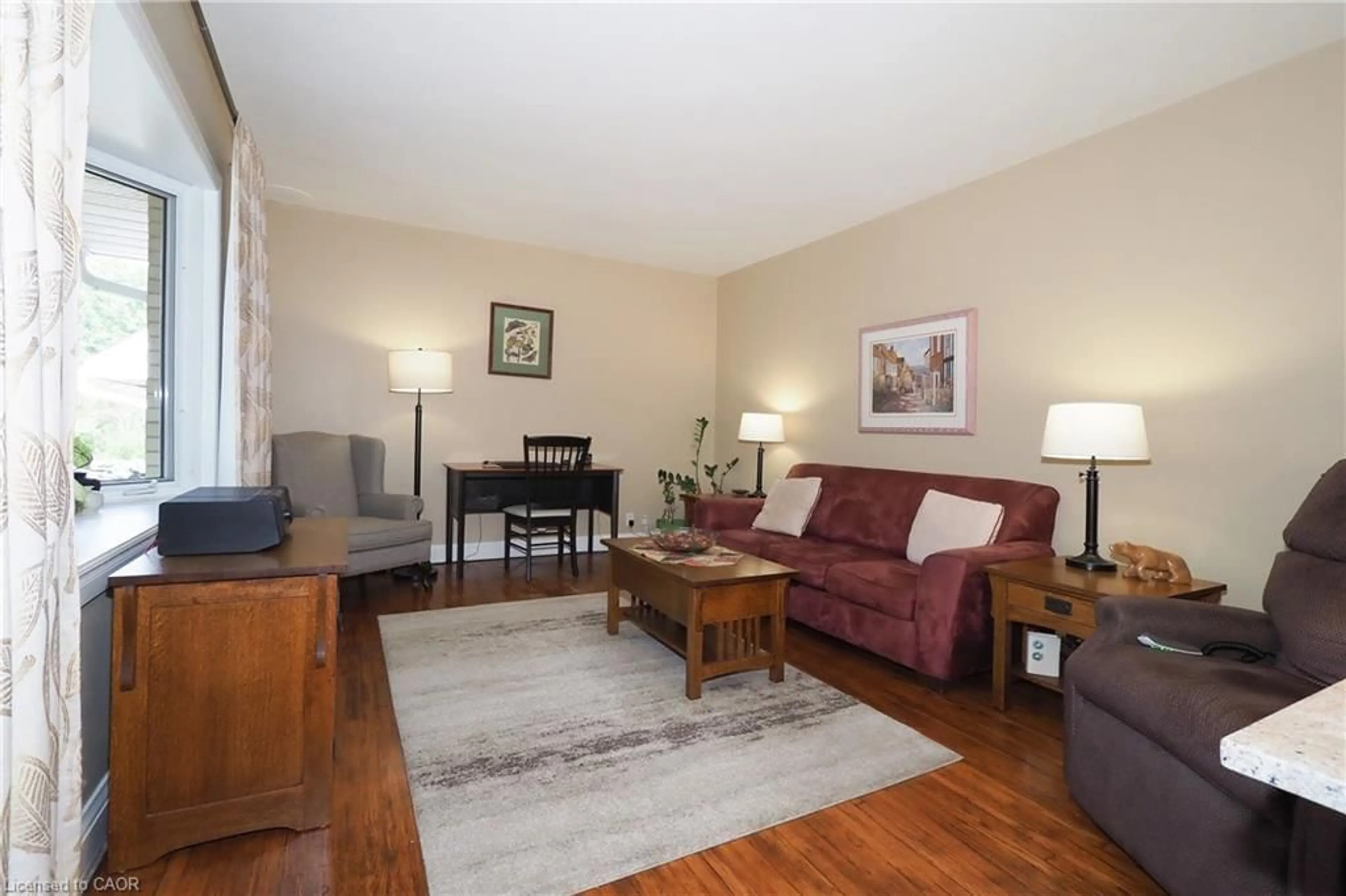 Living room with furniture, wood/laminate floor for 60 Belmont Ave, Kitchener Ontario N2M 1L4