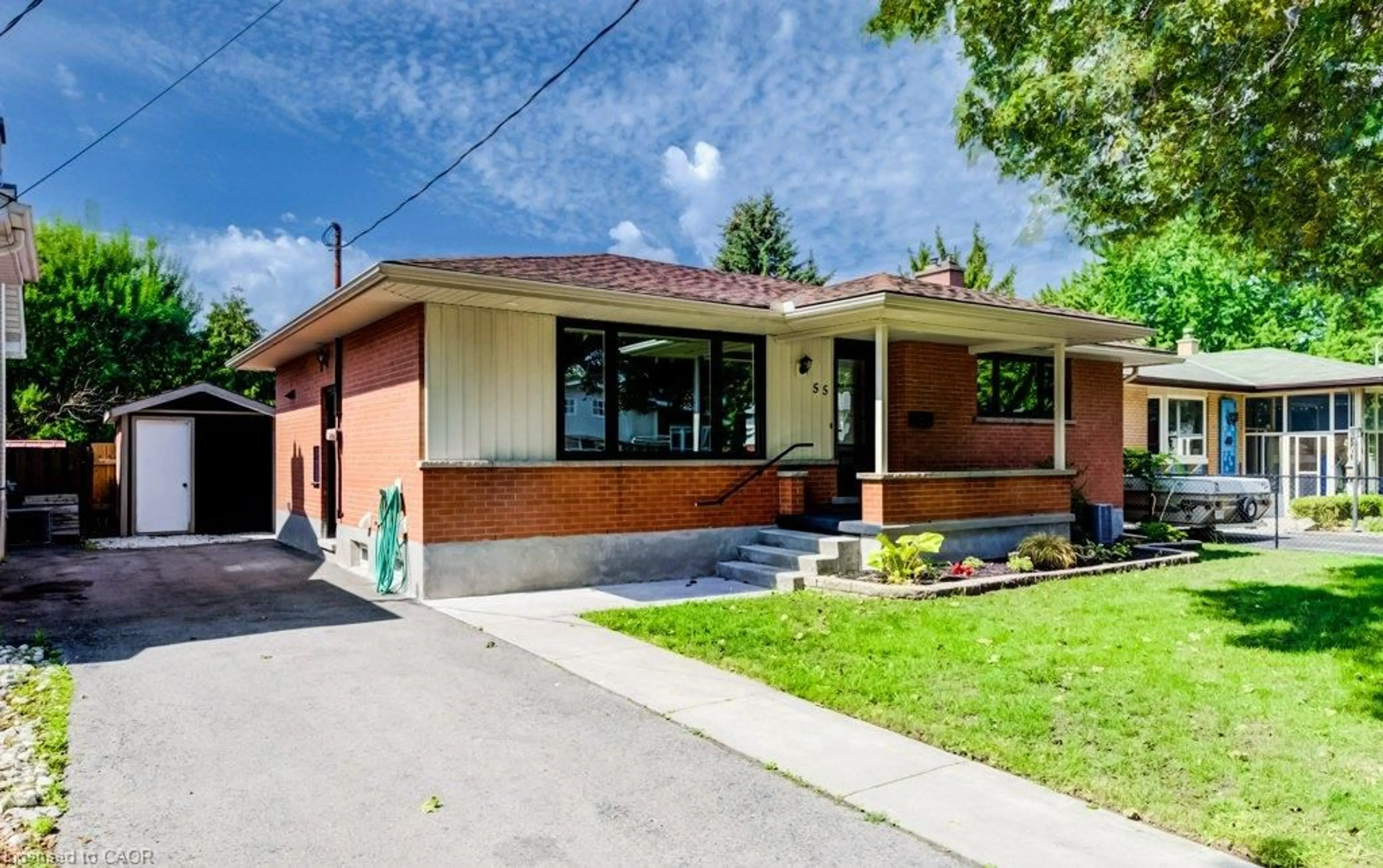 Home with brick exterior material, street for 55 Elkington Dr, Kitchener Ontario N2B 1S1