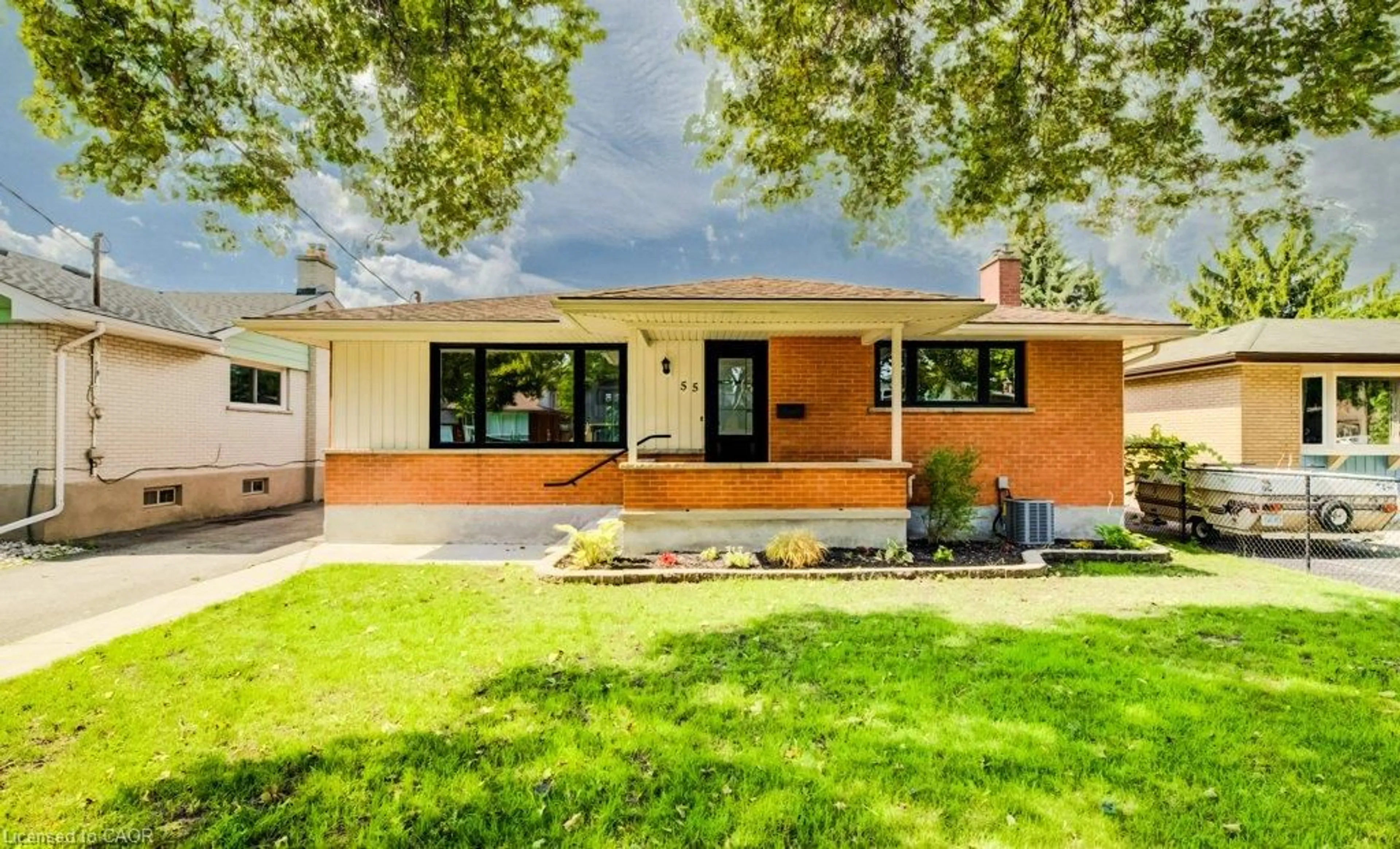 Home with brick exterior material, street for 55 Elkington Dr, Kitchener Ontario N2B 1S1