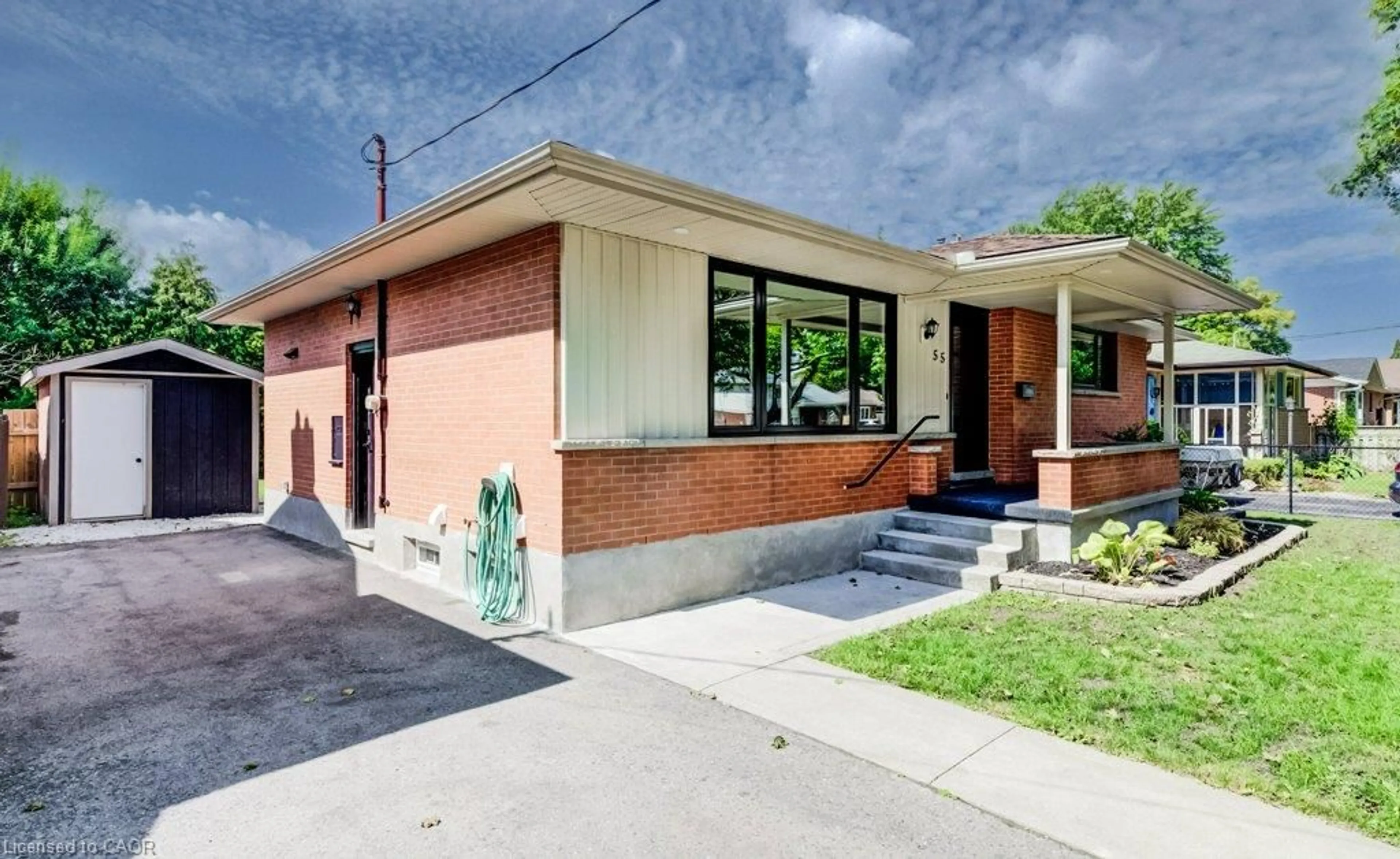 Home with brick exterior material, street for 55 Elkington Dr, Kitchener Ontario N2B 1S1