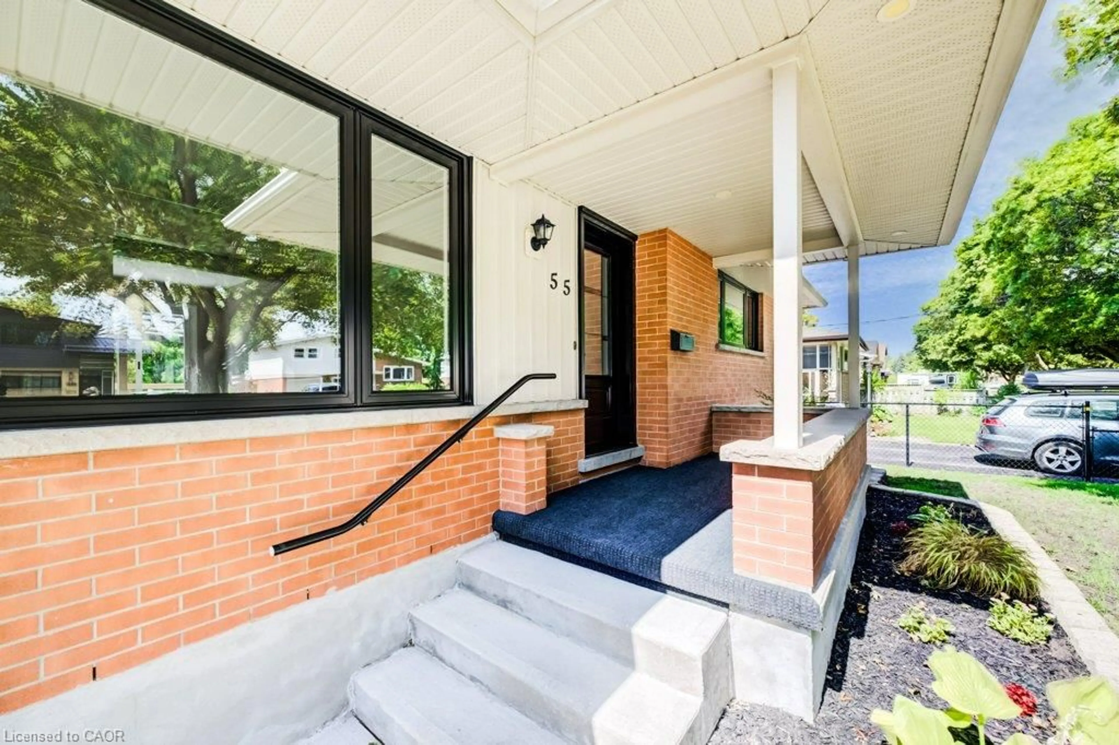 Home with brick exterior material, street for 55 Elkington Dr, Kitchener Ontario N2B 1S1