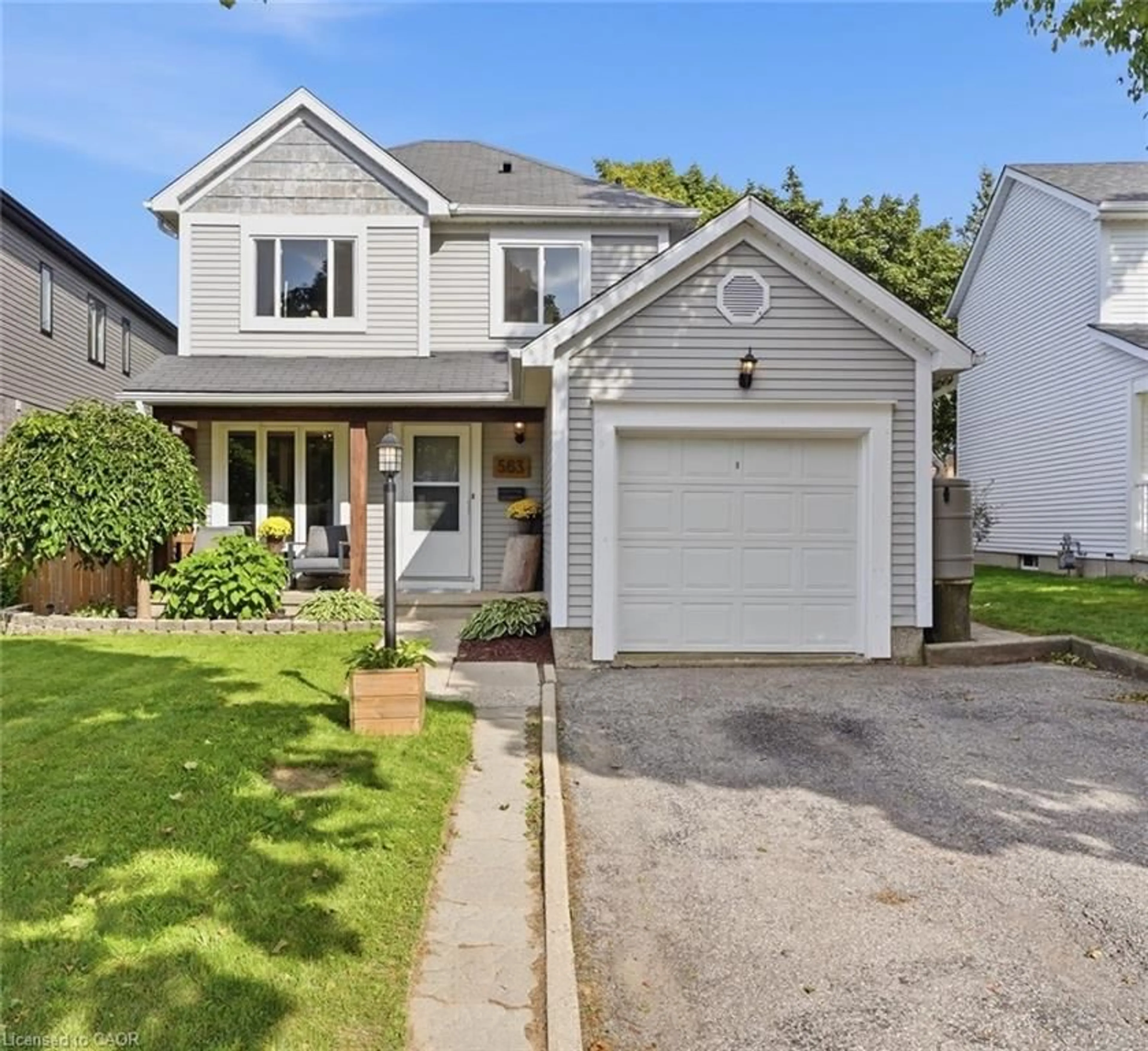Home with vinyl exterior material, street for 563 Westvale Dr, Waterloo Ontario N2T 1G5