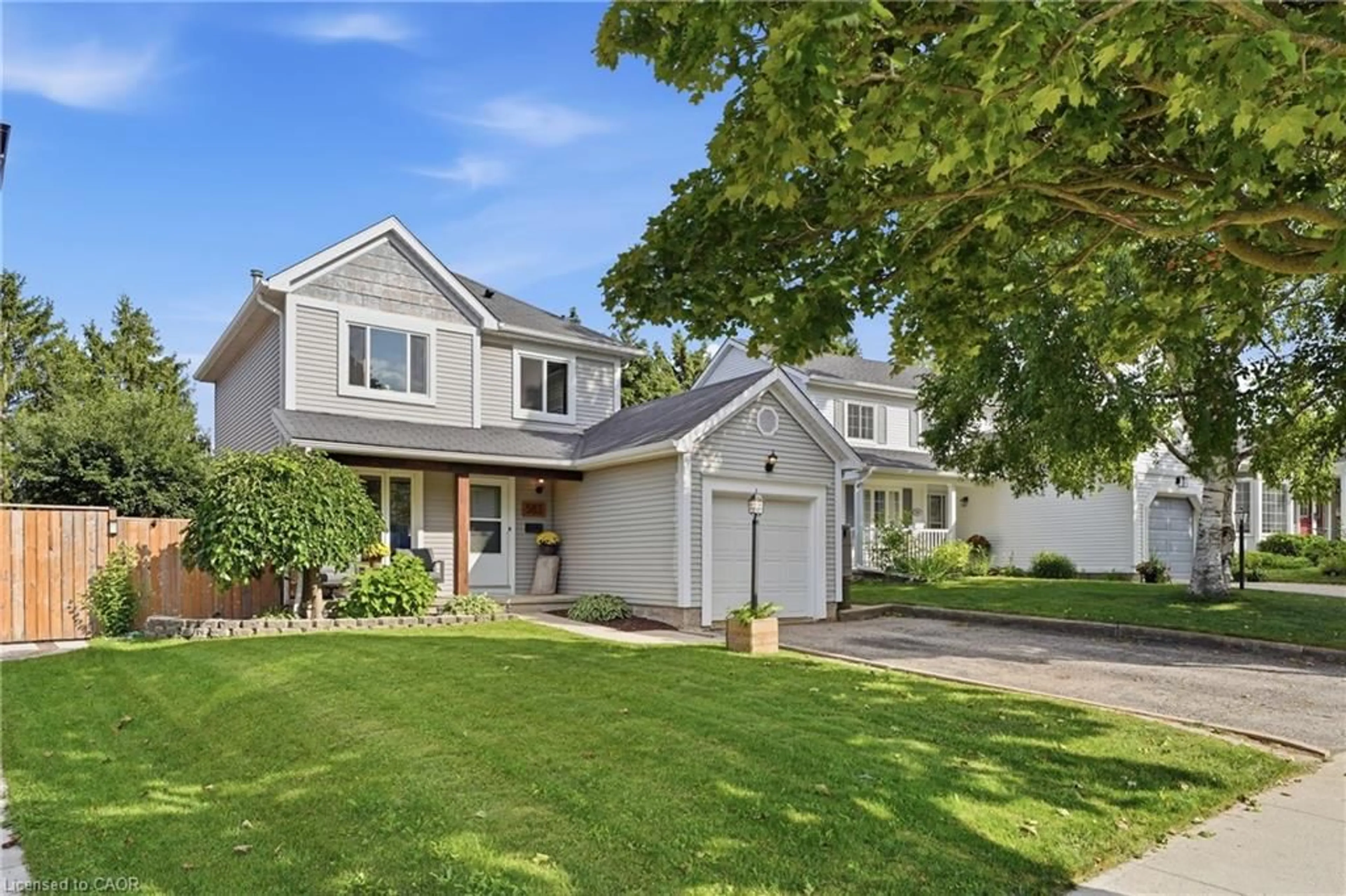Home with vinyl exterior material, street for 563 Westvale Dr, Waterloo Ontario N2T 1G5