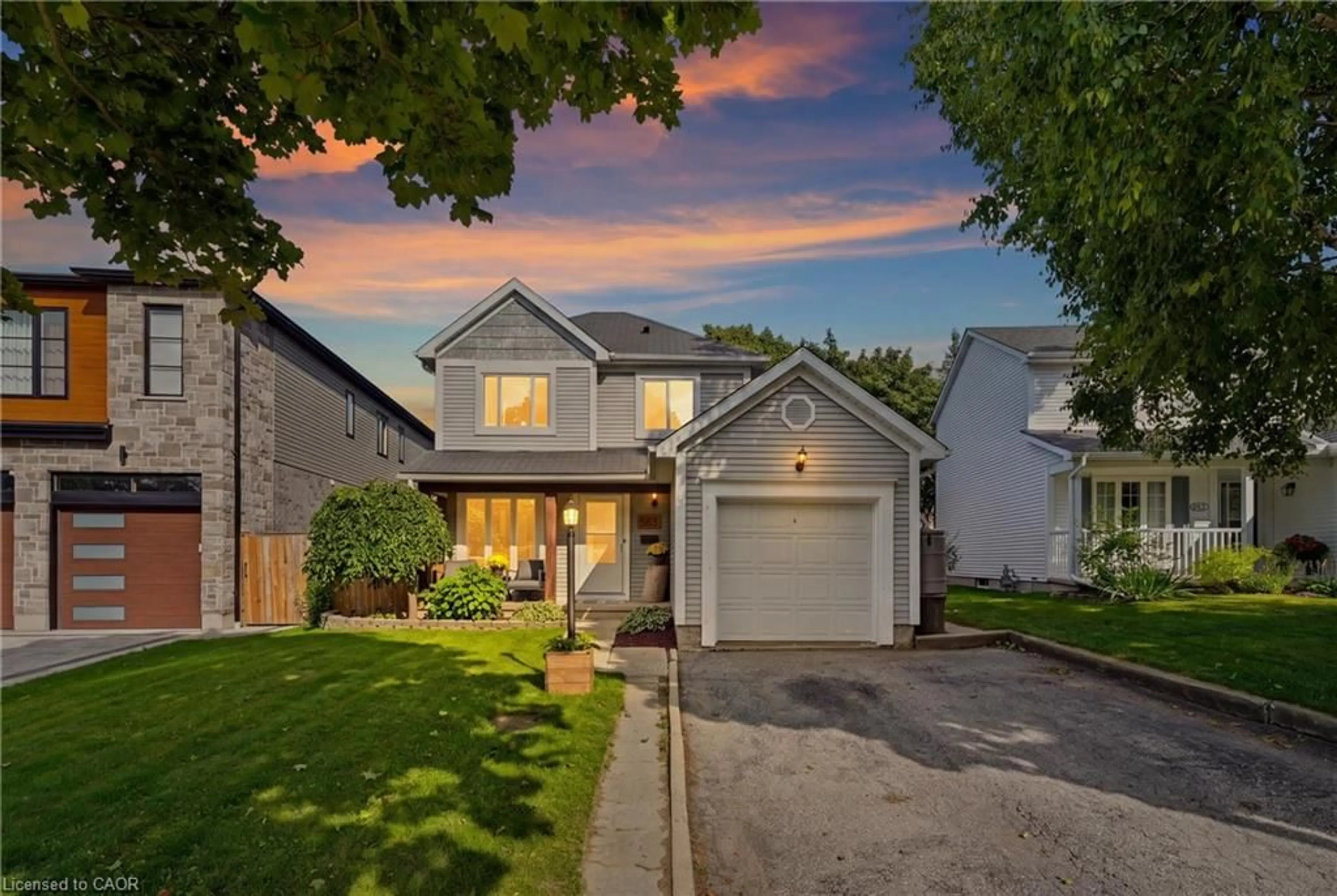 Home with vinyl exterior material, street for 563 Westvale Dr, Waterloo Ontario N2T 1G5