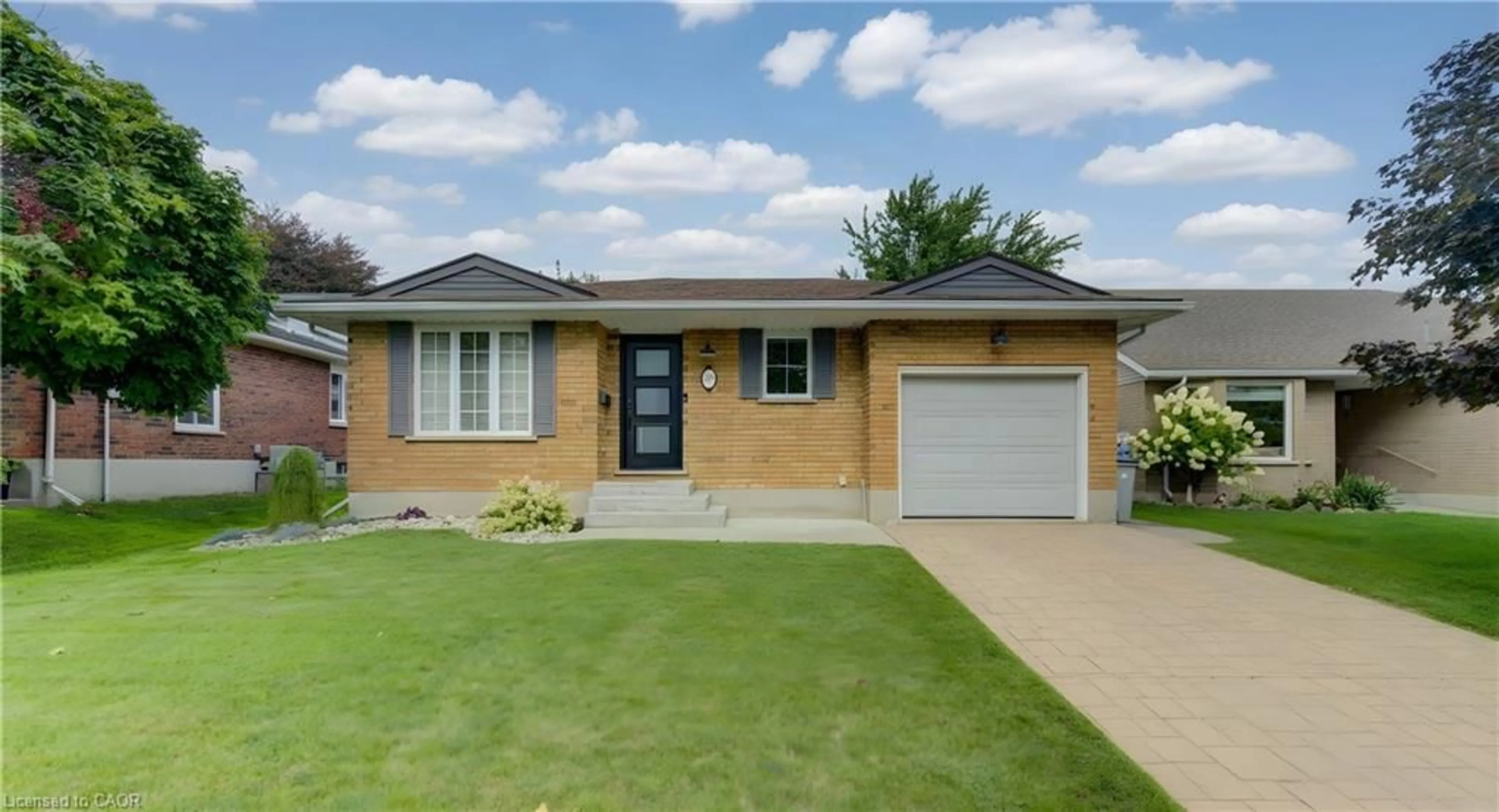 Home with brick exterior material, street for 595 Maple Ave, Listowel Ontario N4W 3G4