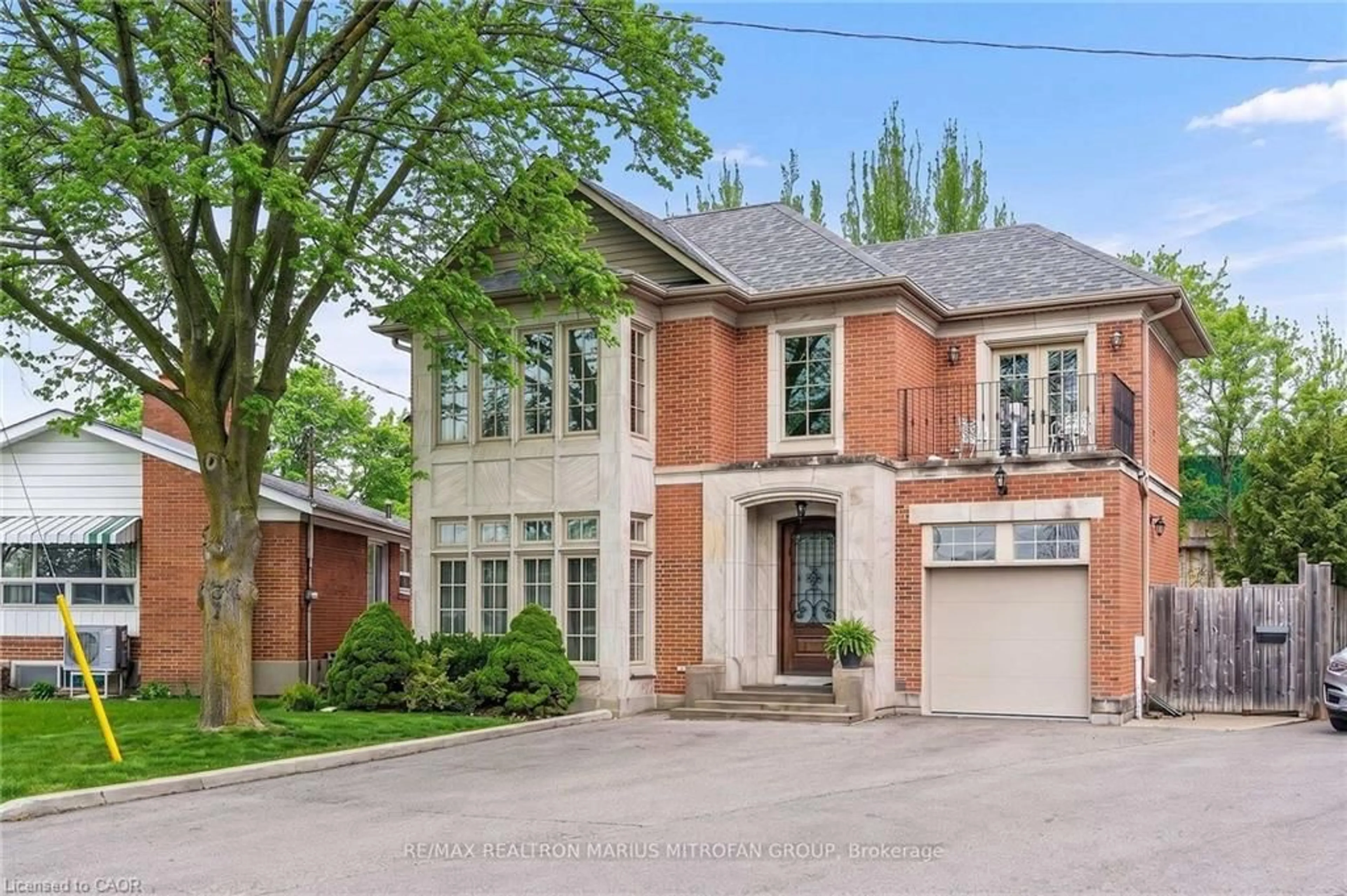 Home with brick exterior material, street for 7 Rollins Pl, Etobicoke Ontario M9B 3Y4