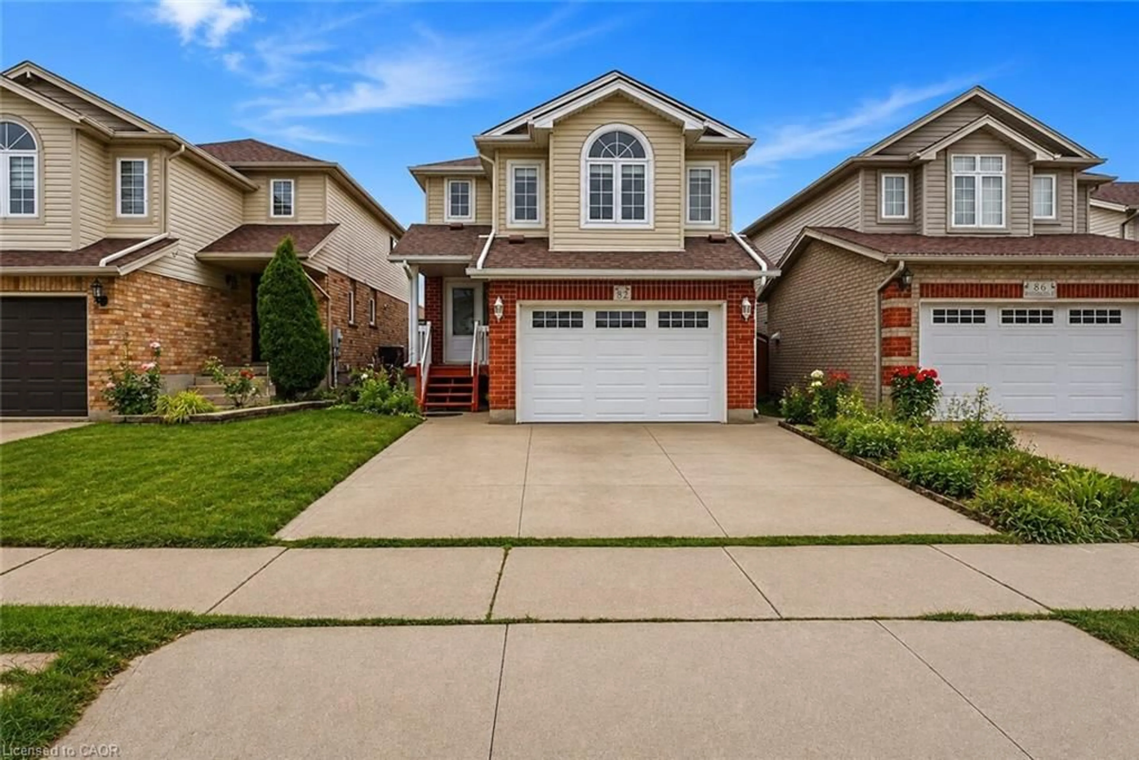 Home with brick exterior material, street for 82 Bridlewreath St, Kitchener Ontario N2E 3V6