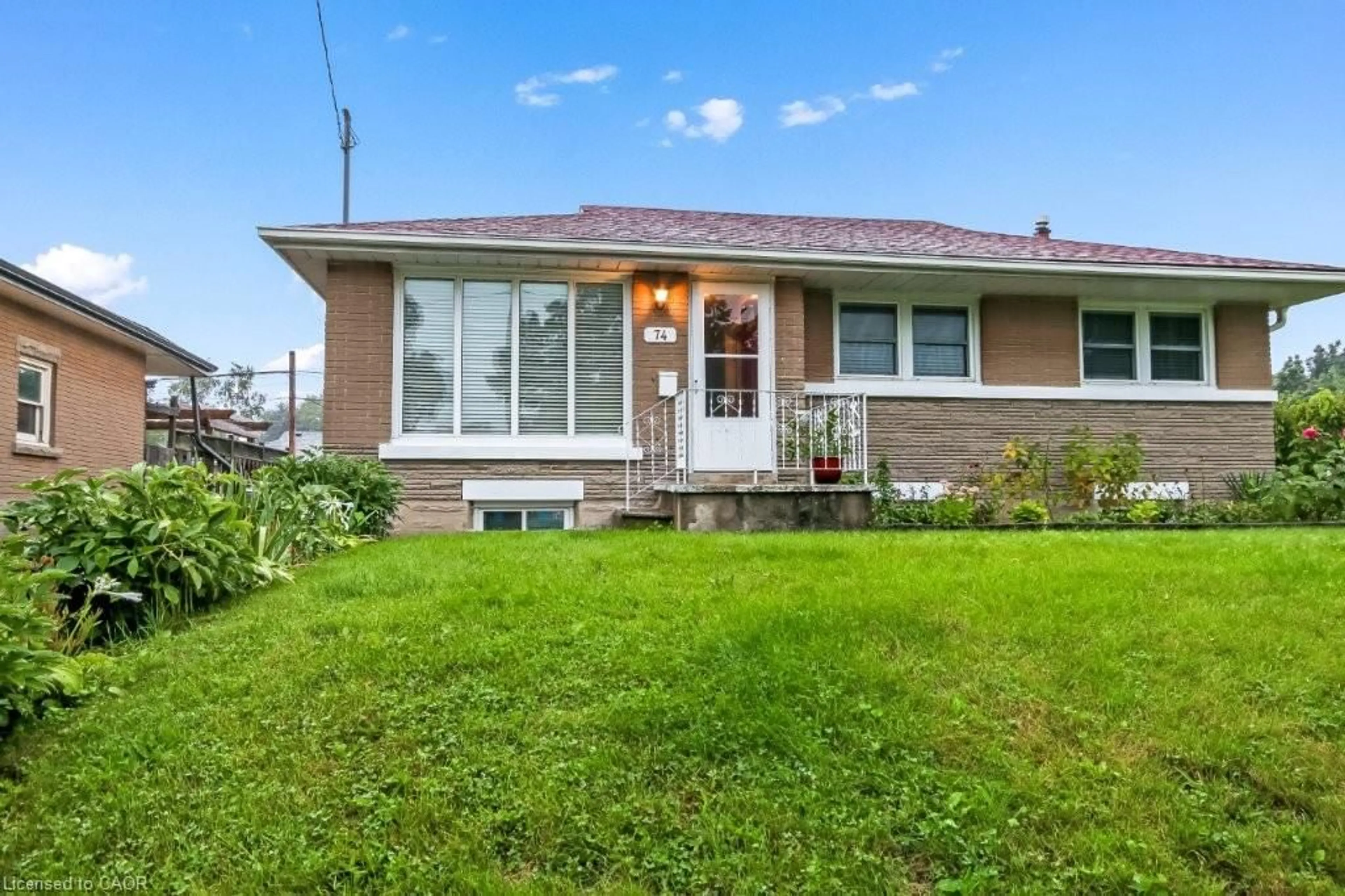 Home with vinyl exterior material, street for 74 Scrimger Ave, Cambridge Ontario N1R 4W3