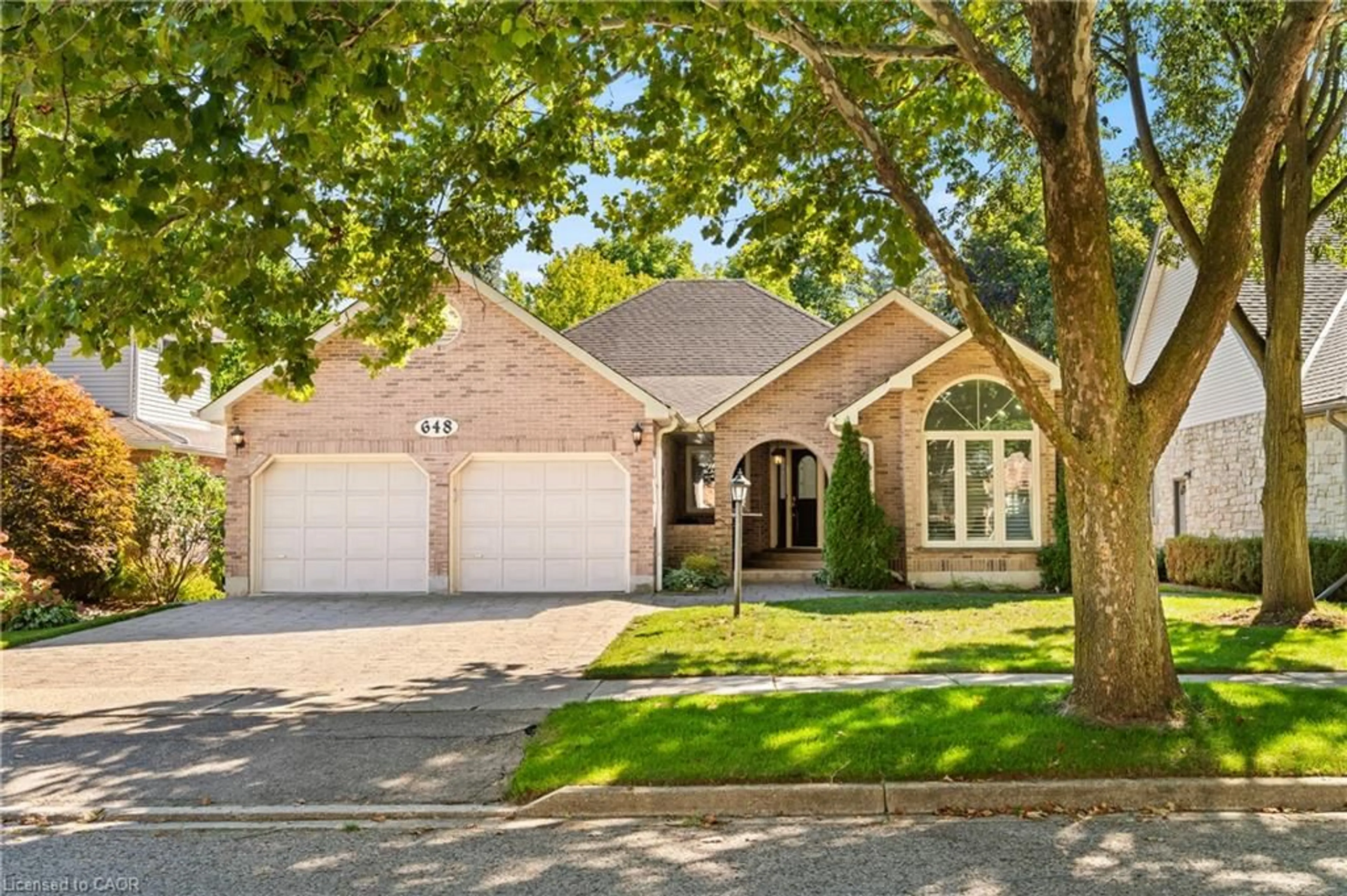 Home with brick exterior material, street for 648 Bayhampton Cres, Waterloo Ontario N2K 3P1