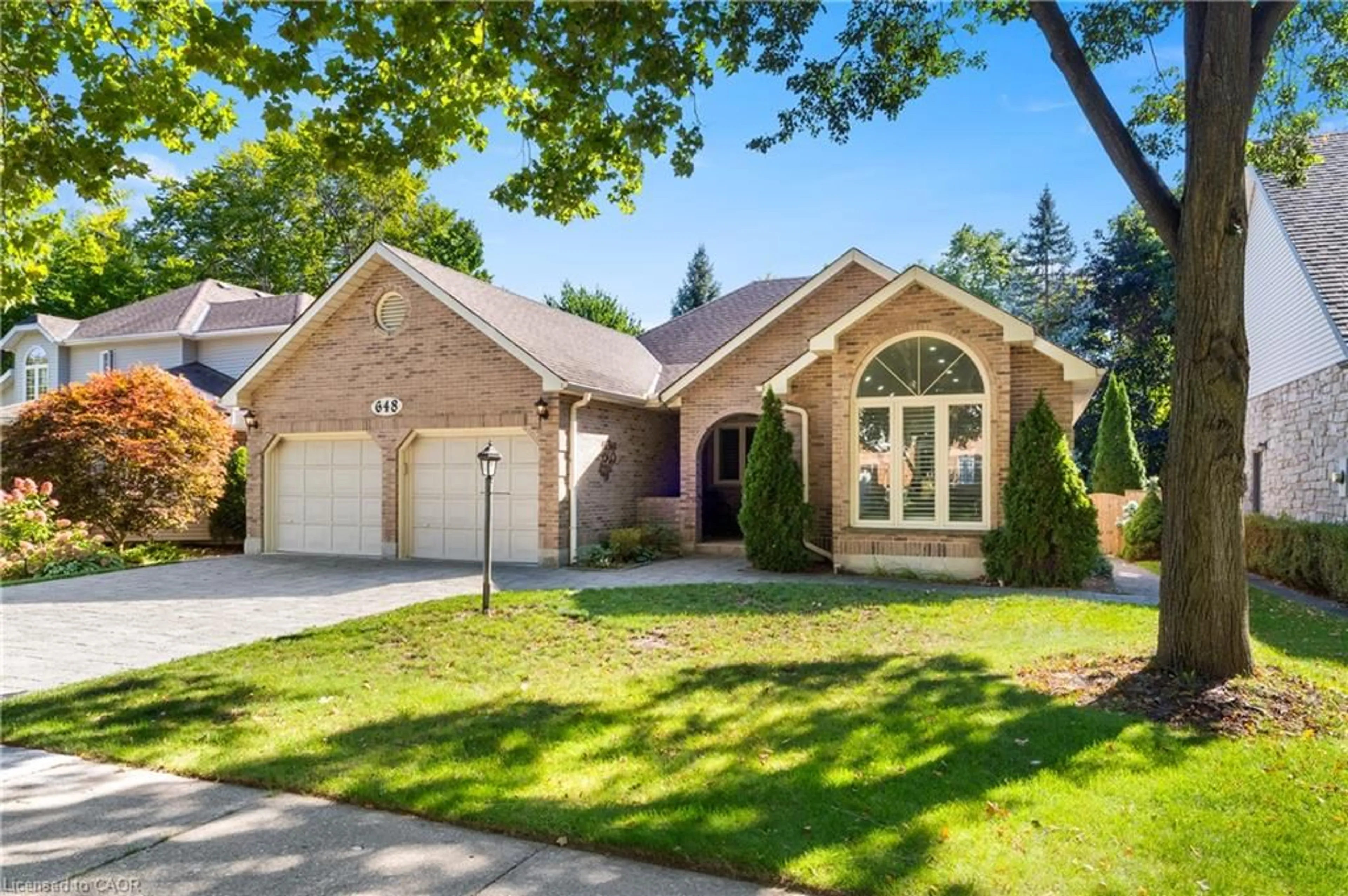 Home with brick exterior material, street for 648 Bayhampton Cres, Waterloo Ontario N2K 3P1