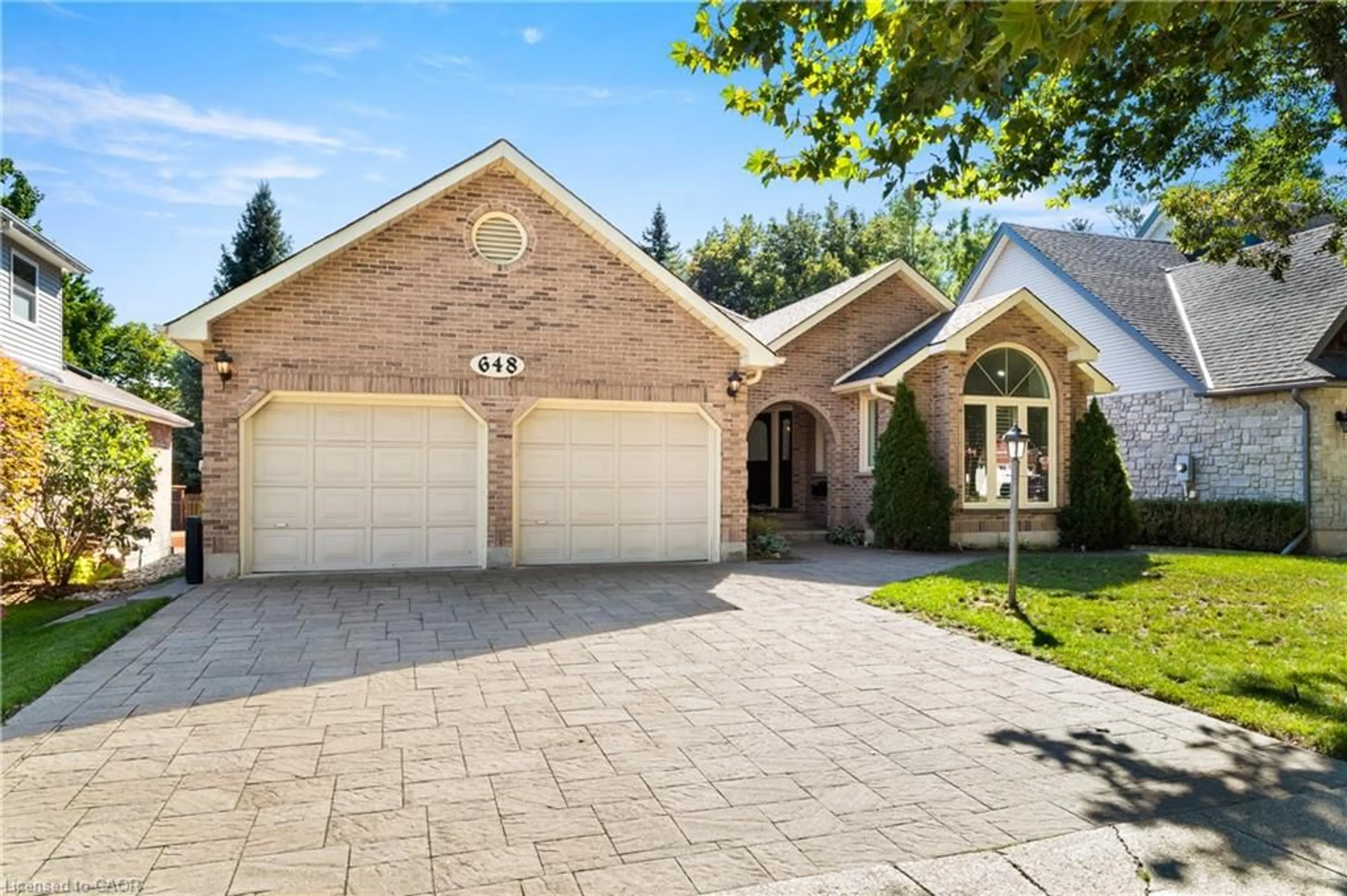 Home with brick exterior material, street for 648 Bayhampton Cres, Waterloo Ontario N2K 3P1