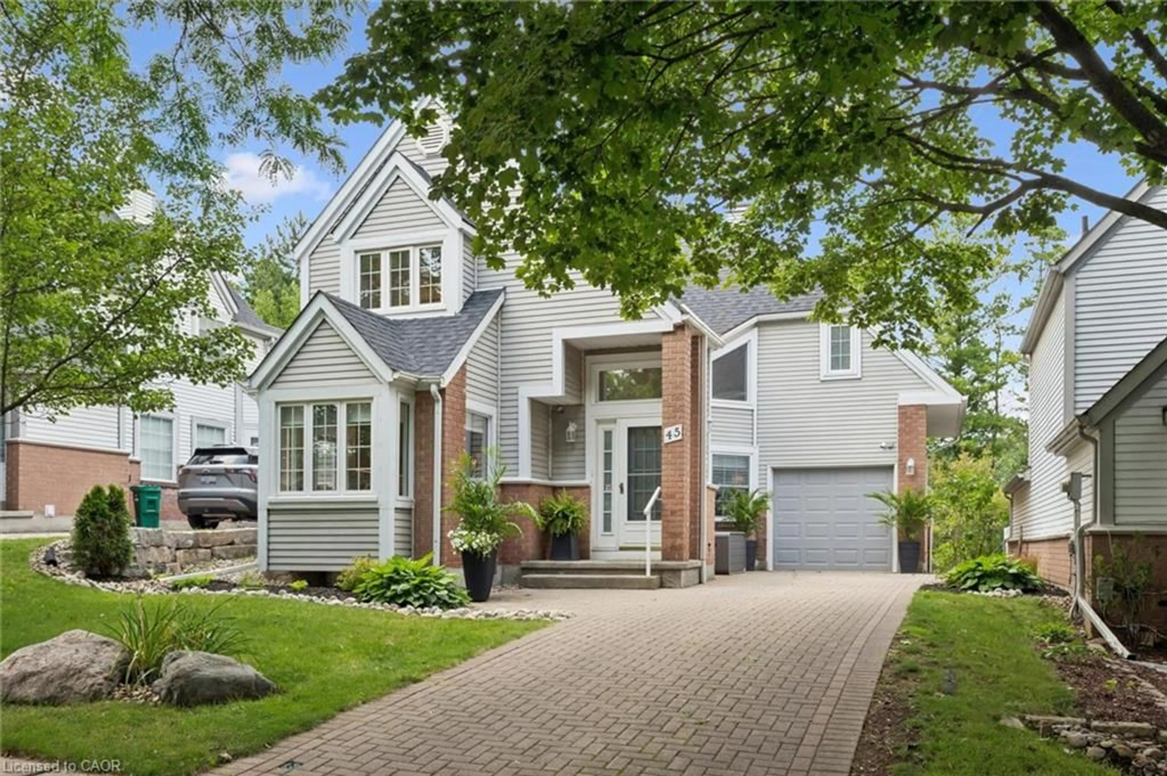 Home with brick exterior material, street for 45 Quinte Cres, Kitchener Ontario N2A 3J8