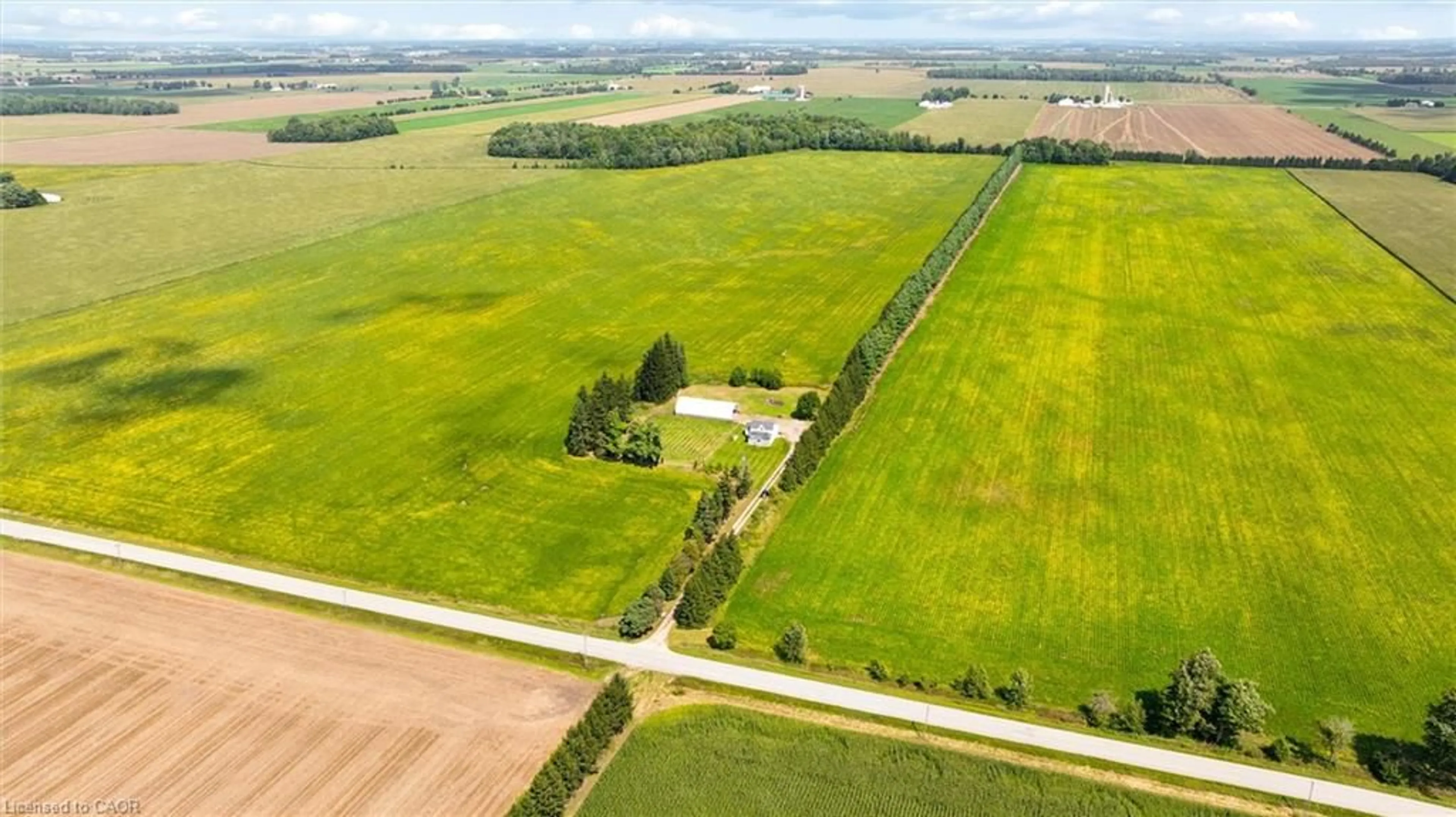 A pic from outside/outdoor area/front of a property/back of a property/a pic from drone, unknown for 5480 Line 42 Line, Mitchell Ontario N0K 1N0