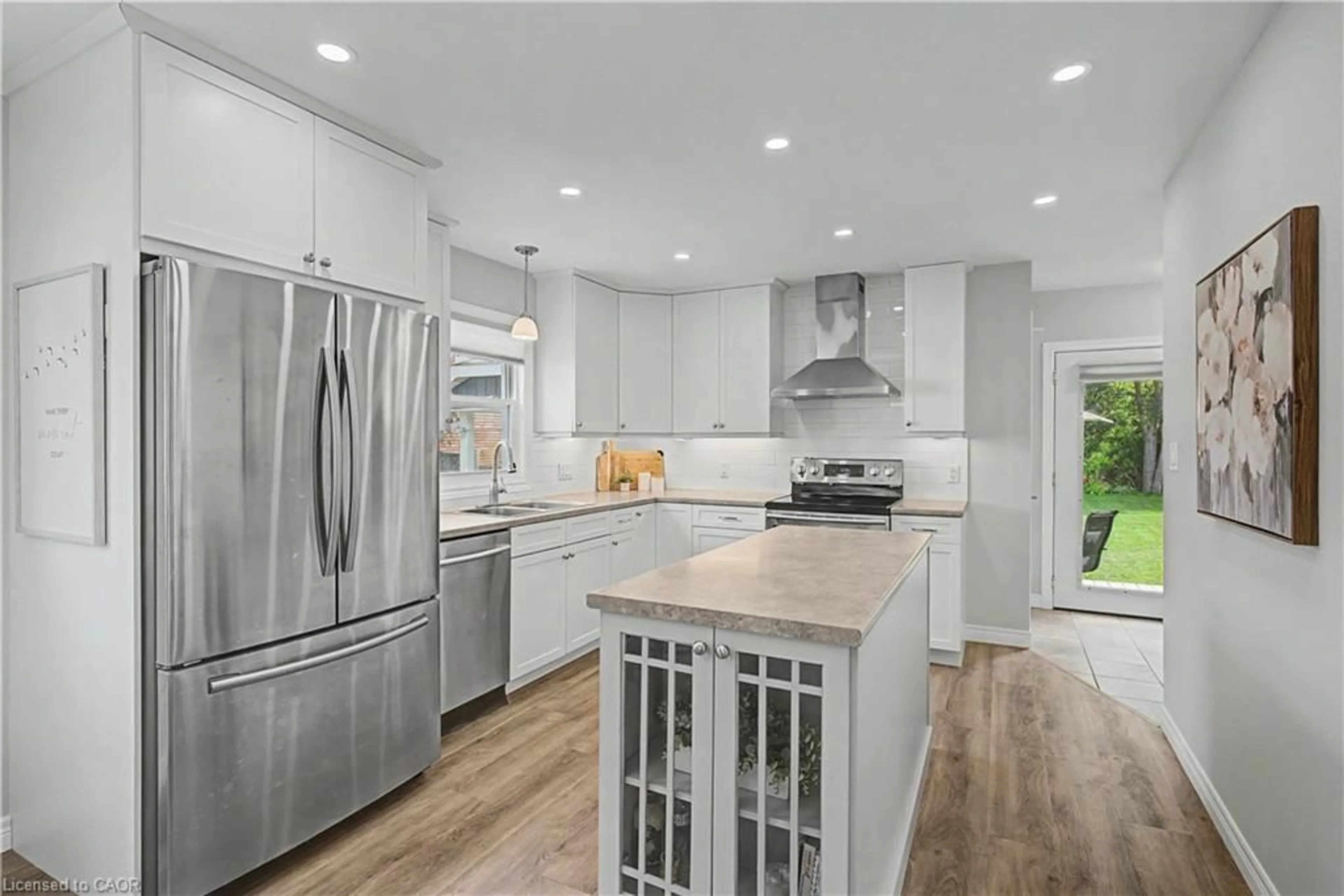 Open concept kitchen, ceramic/tile floor for 61 Maud St, Woodstock Ontario N4S 3Y5