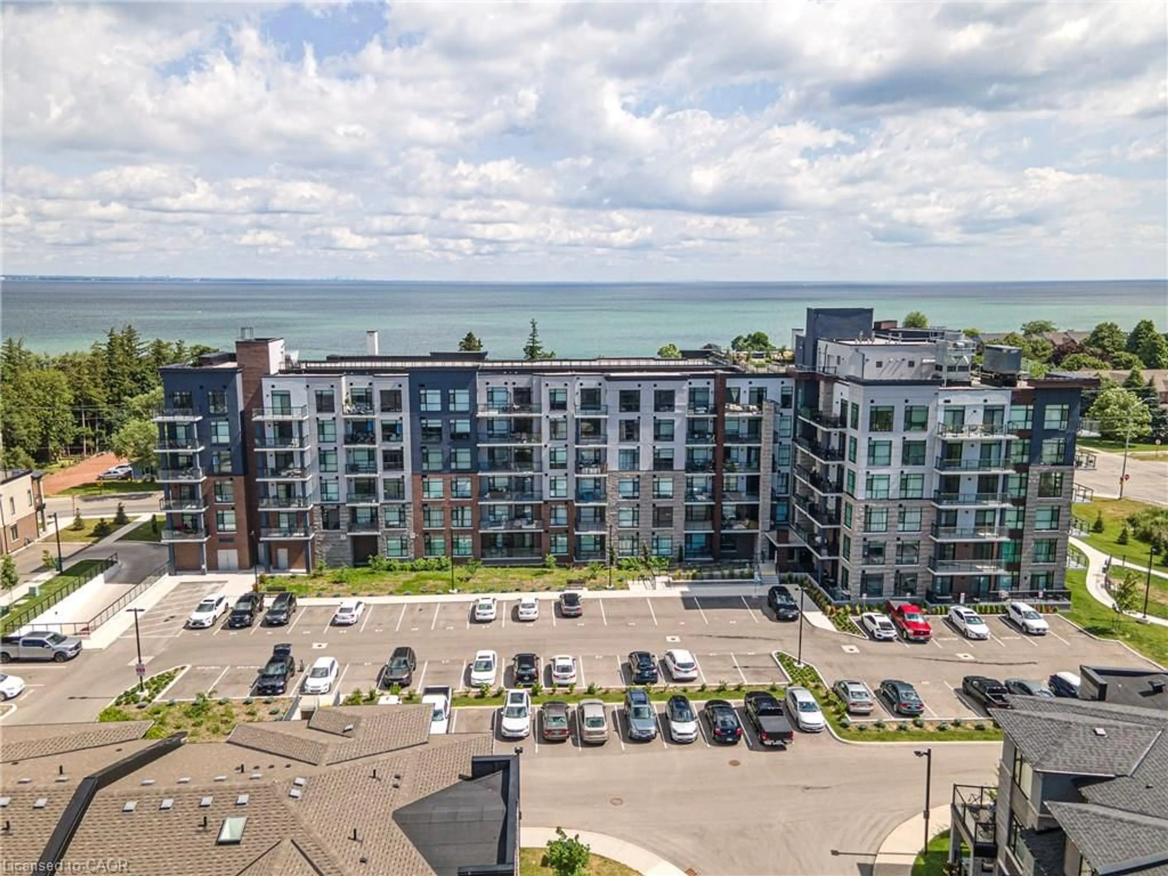 A pic from outside/outdoor area/front of a property/back of a property/a pic from drone, unknown for 600 North Service Rd #301, Stoney Creek Ontario L8E 0L2