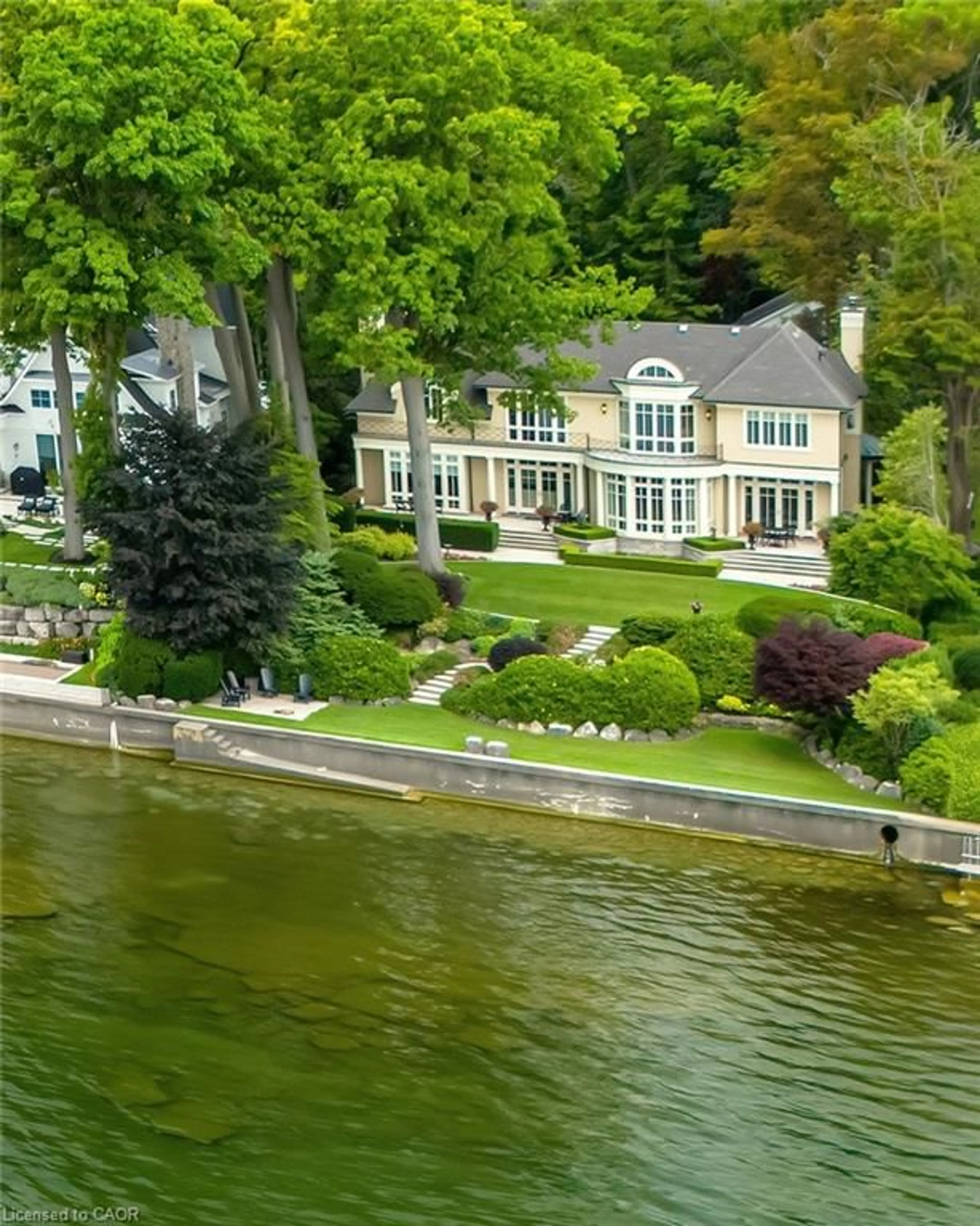 A pic from outside/outdoor area/front of a property/back of a property/a pic from drone, water/lake/river/ocean view for 6 Ennisclare Dr, Oakville Ontario L6J 4N2